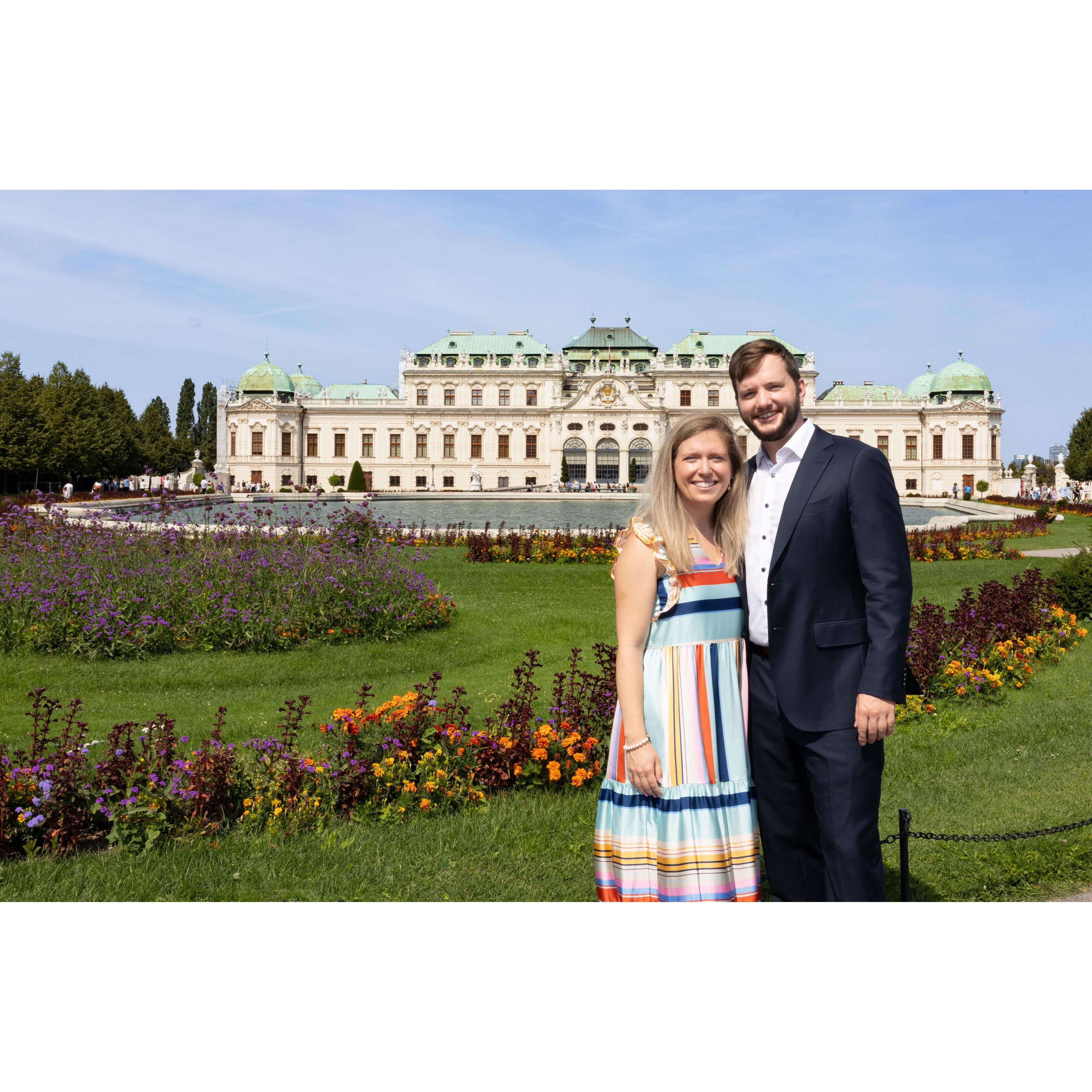 In front of the Belvedere Palace in Vienna, where Connor proposed at the annual Christmas market.