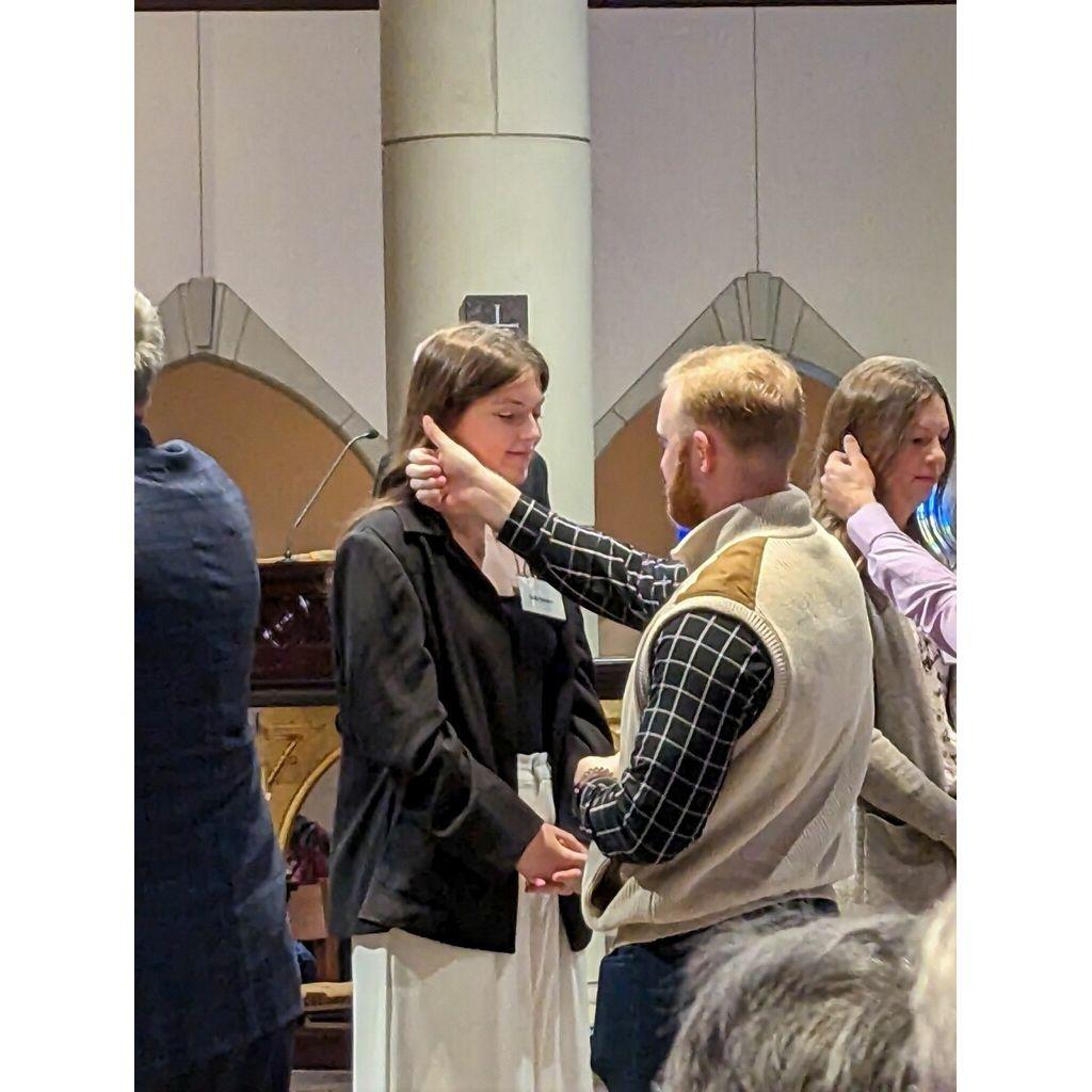 Brady sponsored Lydia through her Catholic conversion journey. This is a picture of the day Lydia received one of the sacraments