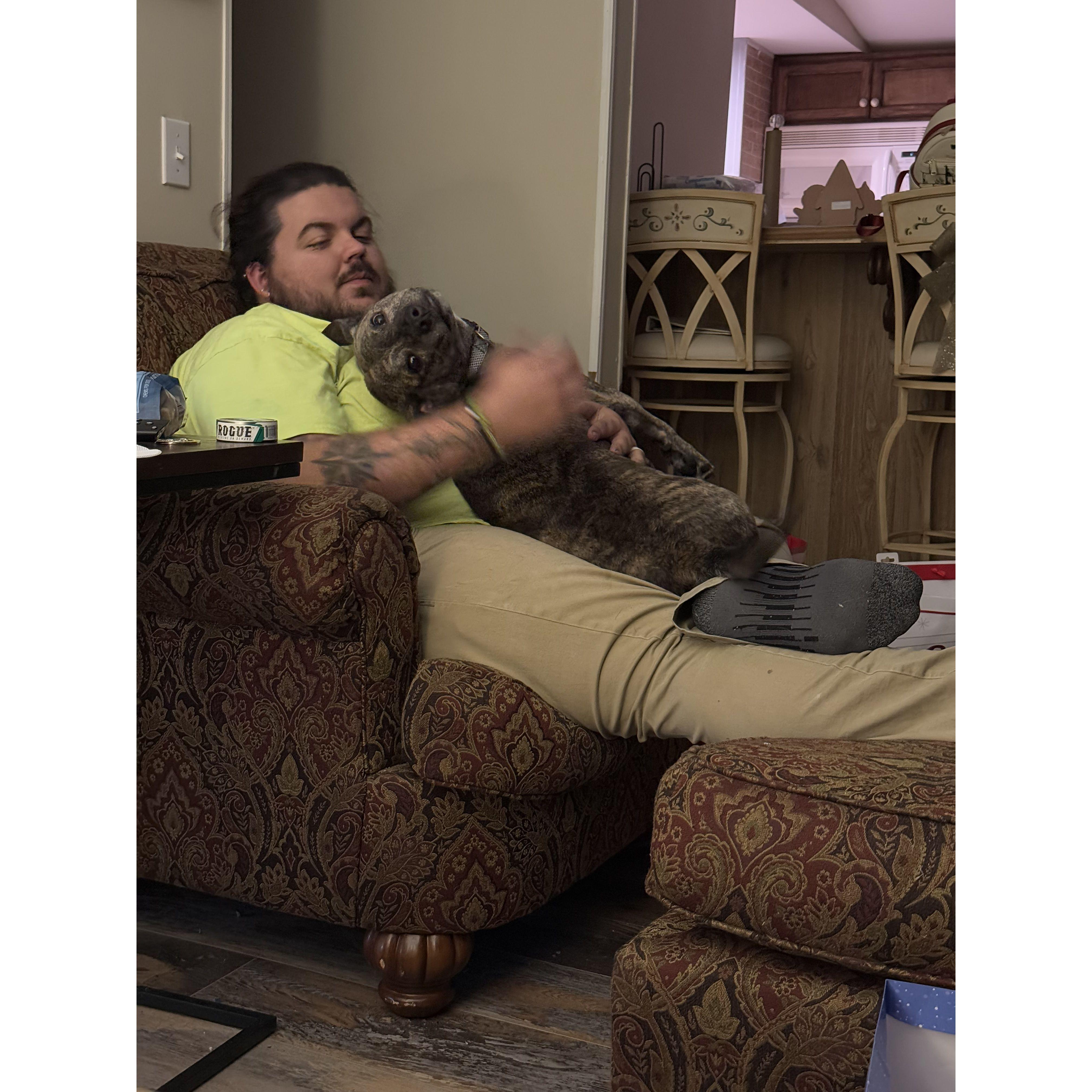 Our sweet boy fester loving to sit with his daddy