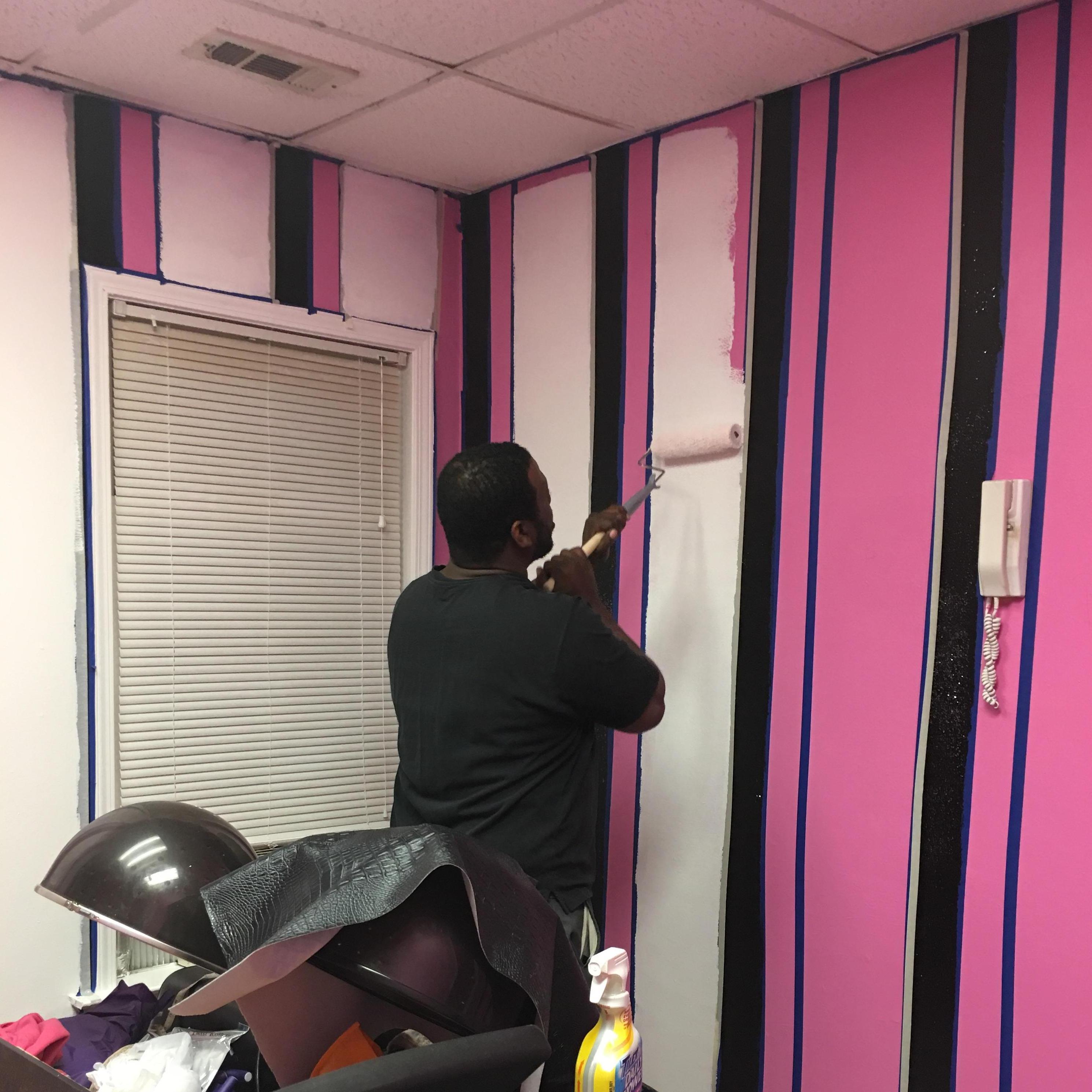 My baby painting my suite, helping me upgrade my salon suite!