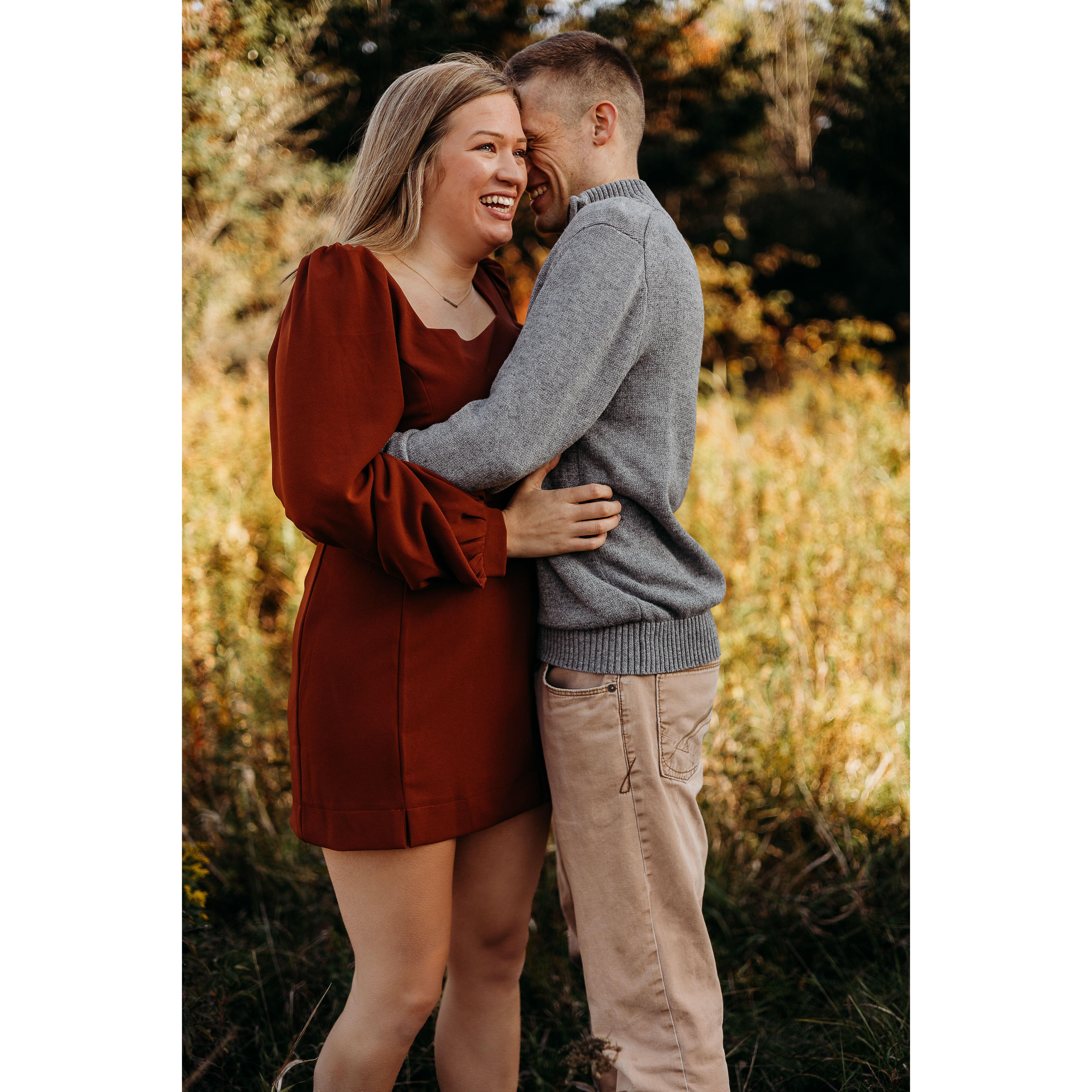 Our photographer told Ben he needed to whisper something funny in Kait's ear... this picture- PRICELESS