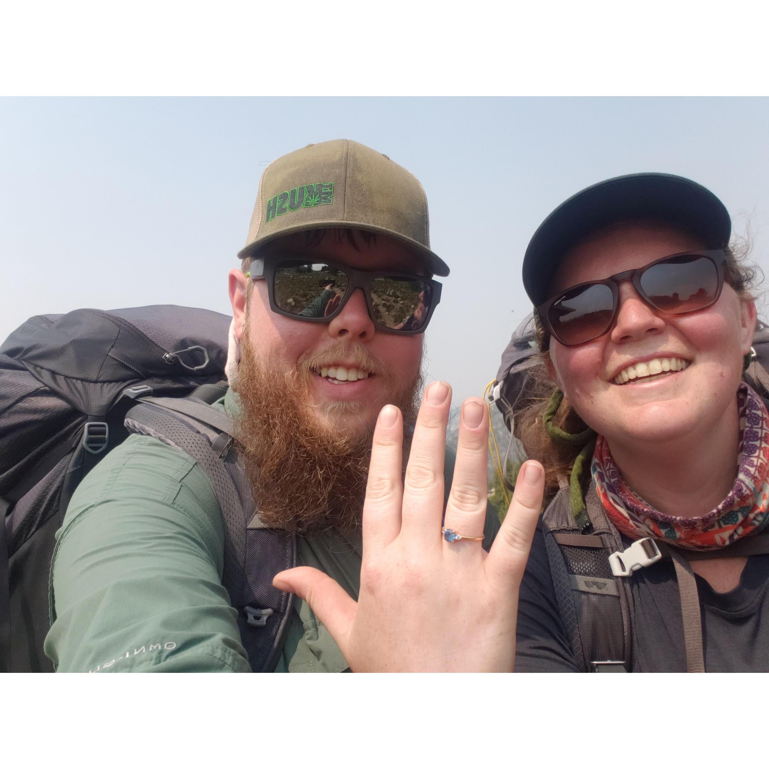 The proposal, up at 9,500 feet on a backpacking trip in the Absaroka mountains (which we look at from our house). Bryce got on a knee without even removing his 40 lb backpack. Jacqui said yes!