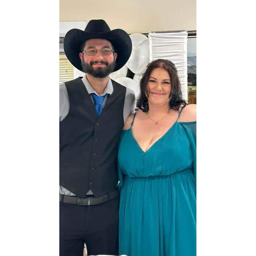 At Emma's dad's wedding! It was Josh and Emma's first time at a wedding.