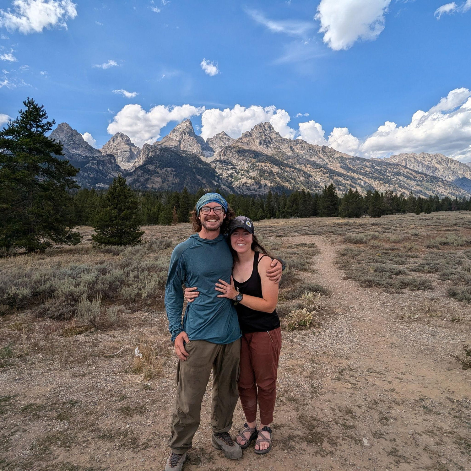 Us after hiking out from climbing the Grand Teton in September 2024.