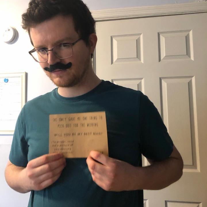 Mark was asked to be the best man, and the card states to post with the mustache.