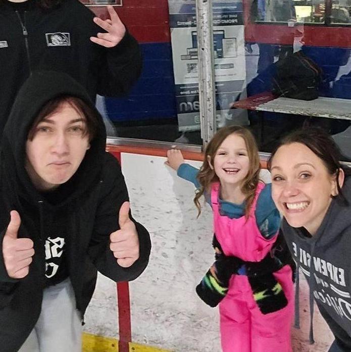 Family fun ice skating with the offspring