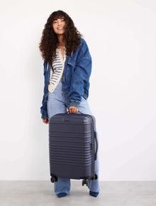 HIS LUGGAGE