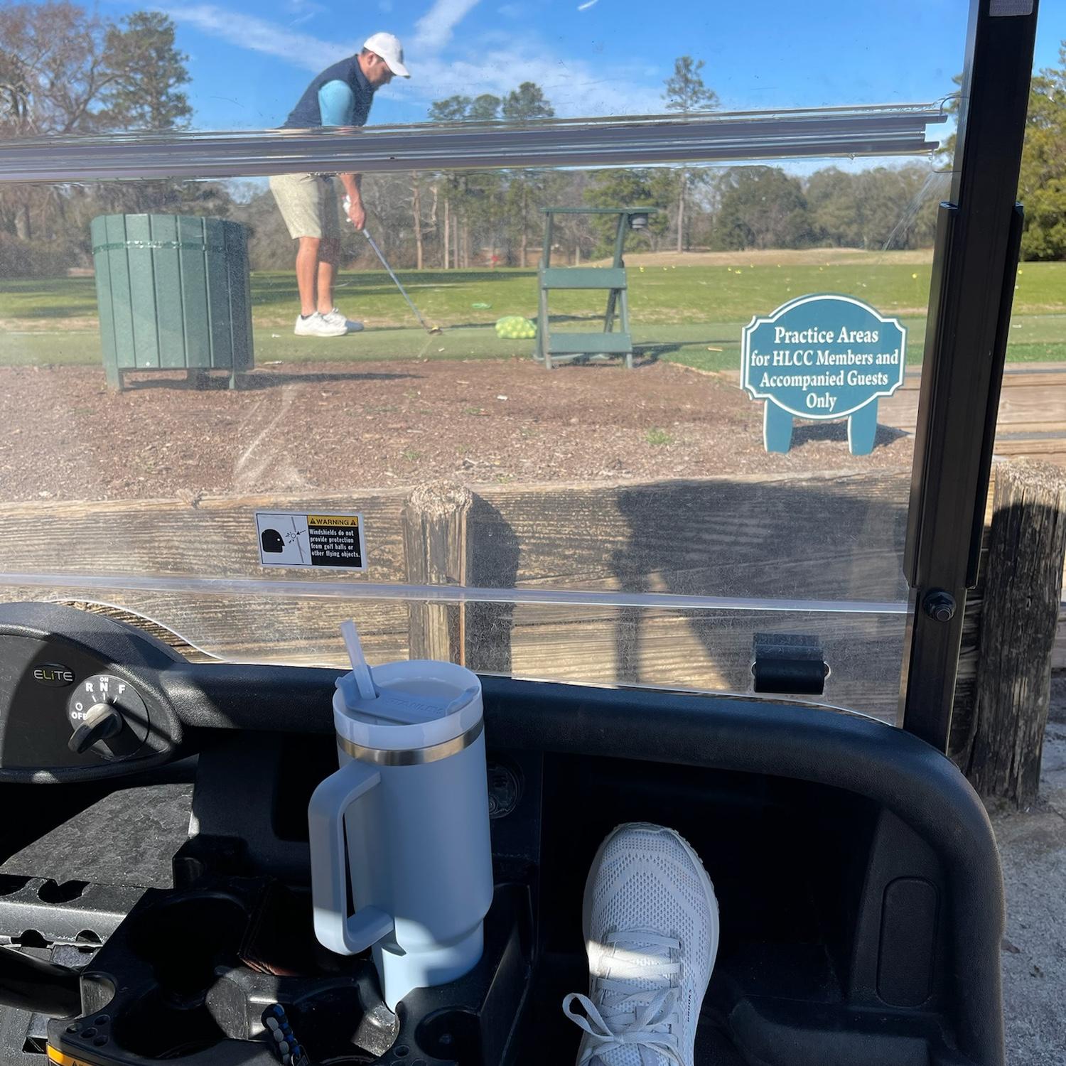 Lots of days at the golf course (Katelyn with a book)