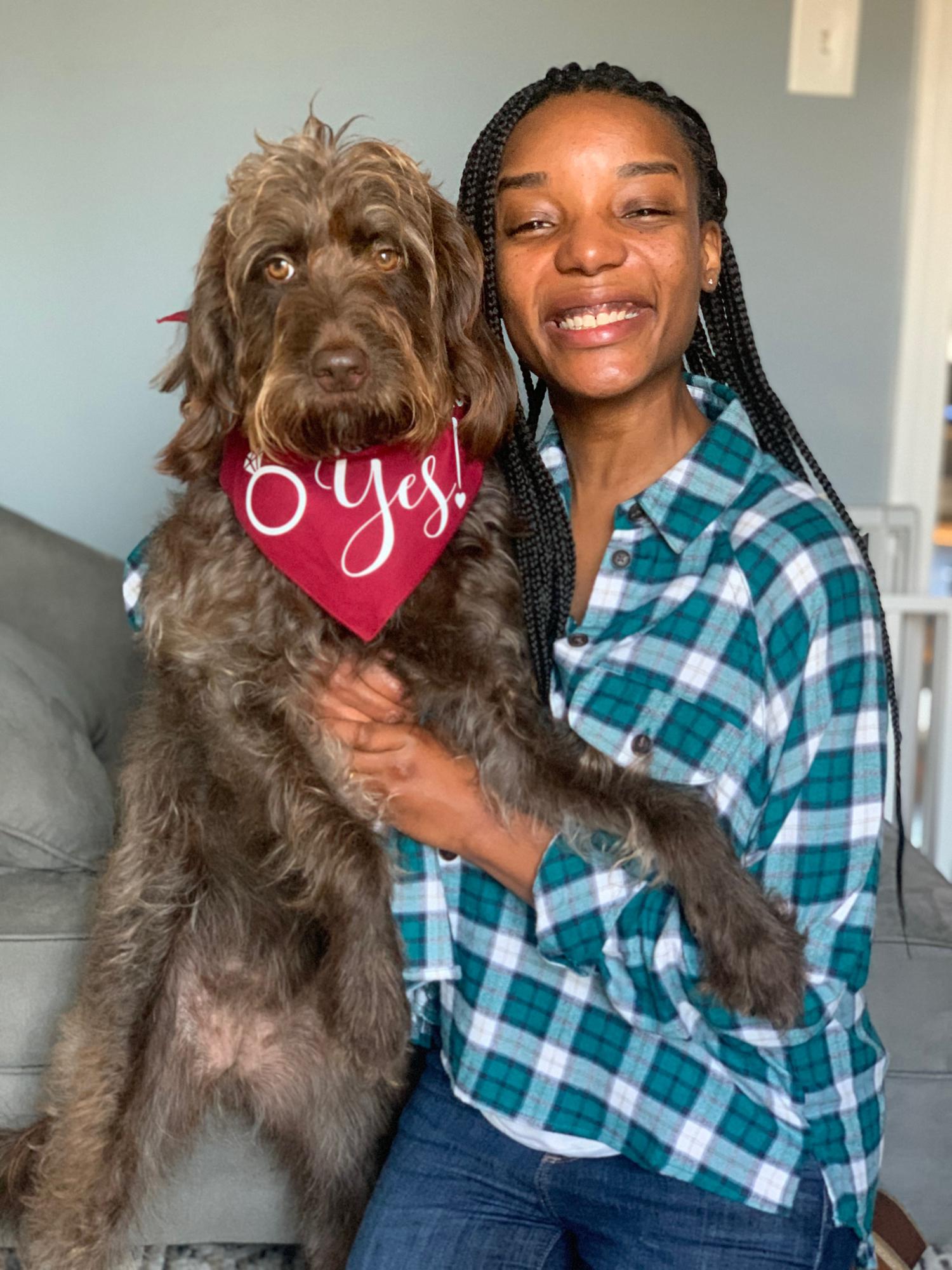 Míchelle made Stella pose for a picture with her adorable bandana that Stacy put on her just before he proposed! It reads: My mom said yes!