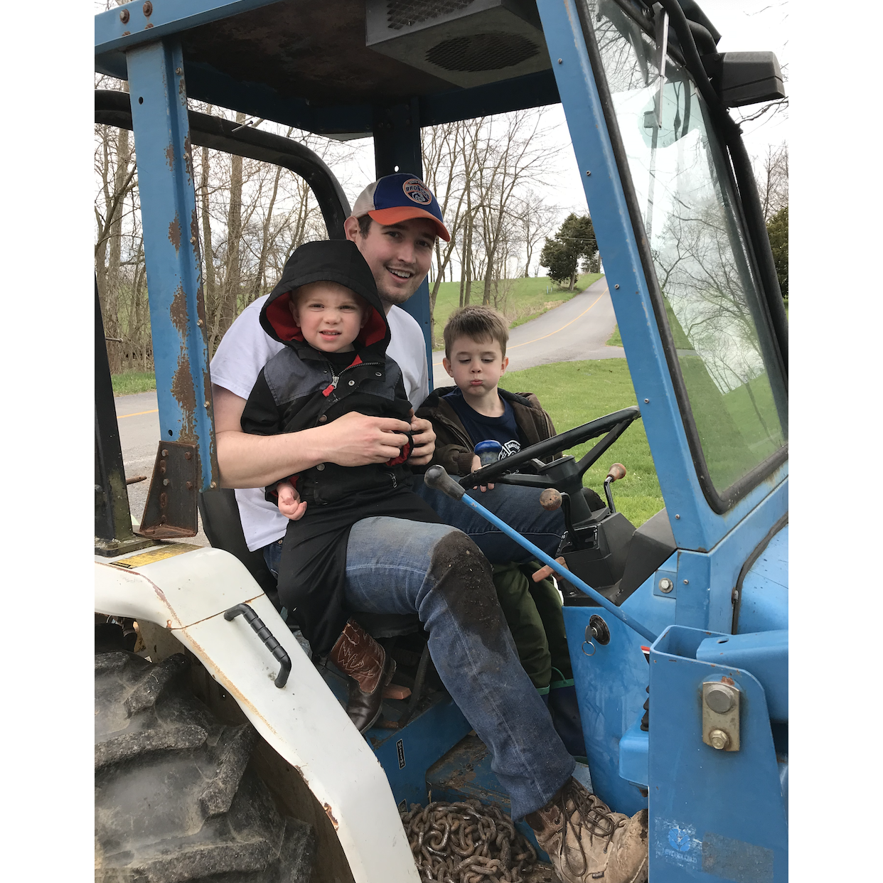 Howard and Wesley joining "Uncle Pete" while he landscaped.