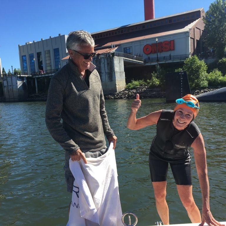 Here we are on the Willamette River where Judy did the Portland Bridge swim.