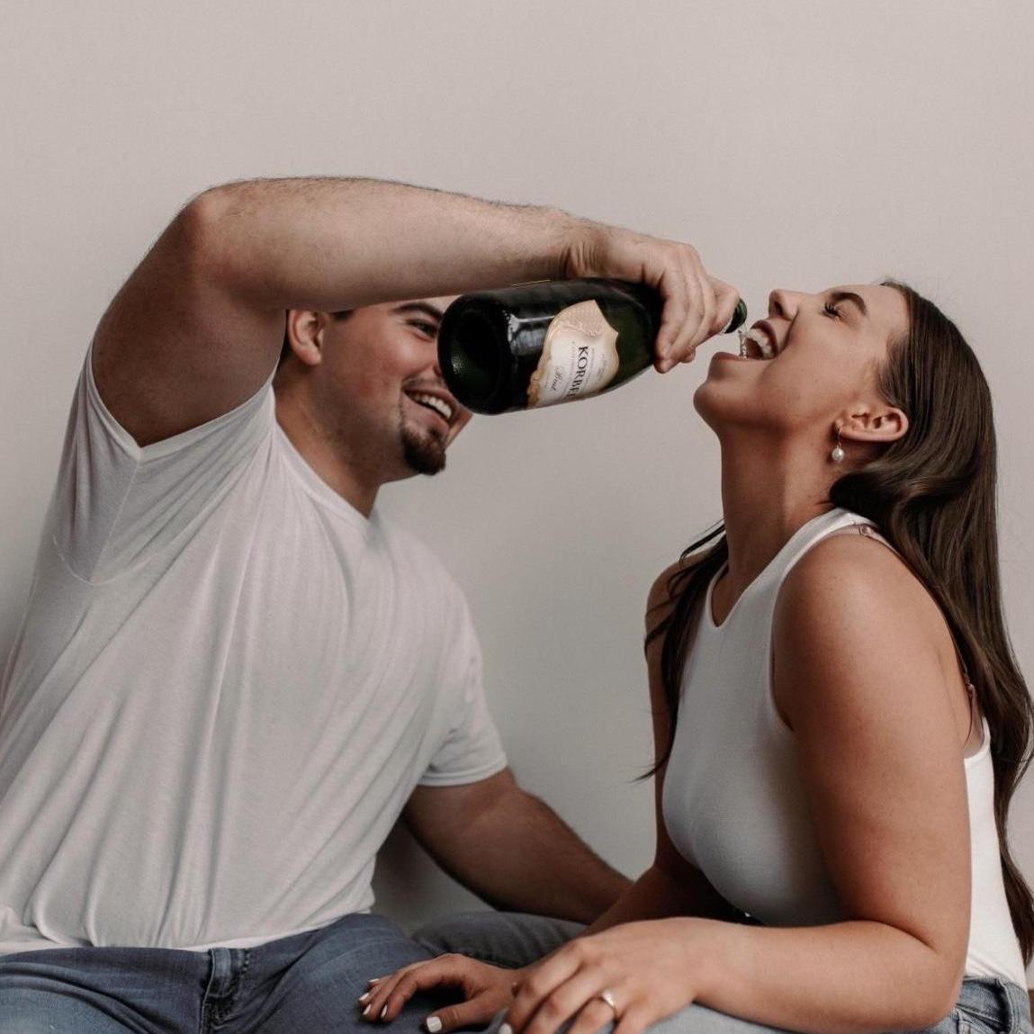 Popped some bubbly because we're getting MARRIED! 🍾