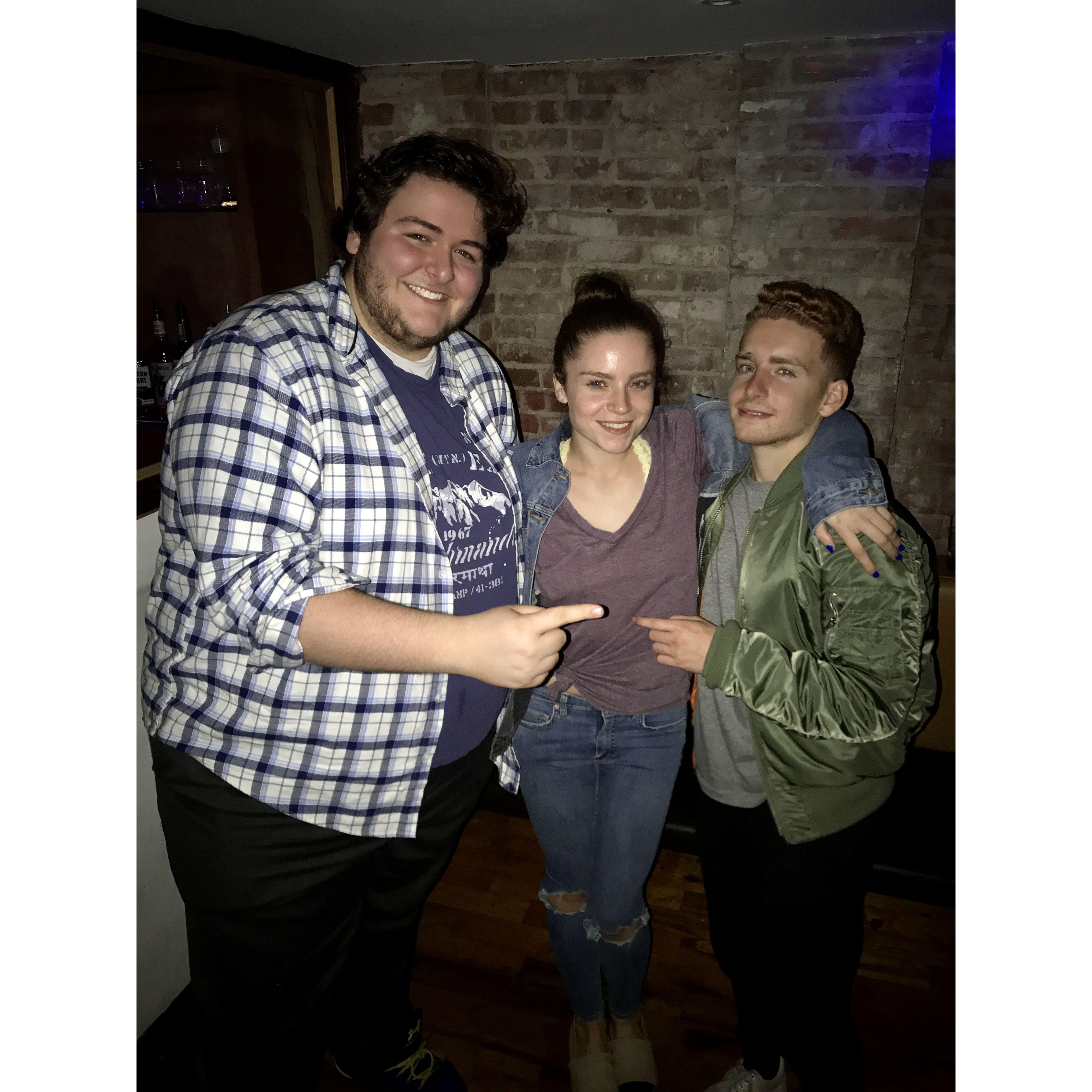 Our first picture together, set up by our best friend on the left.