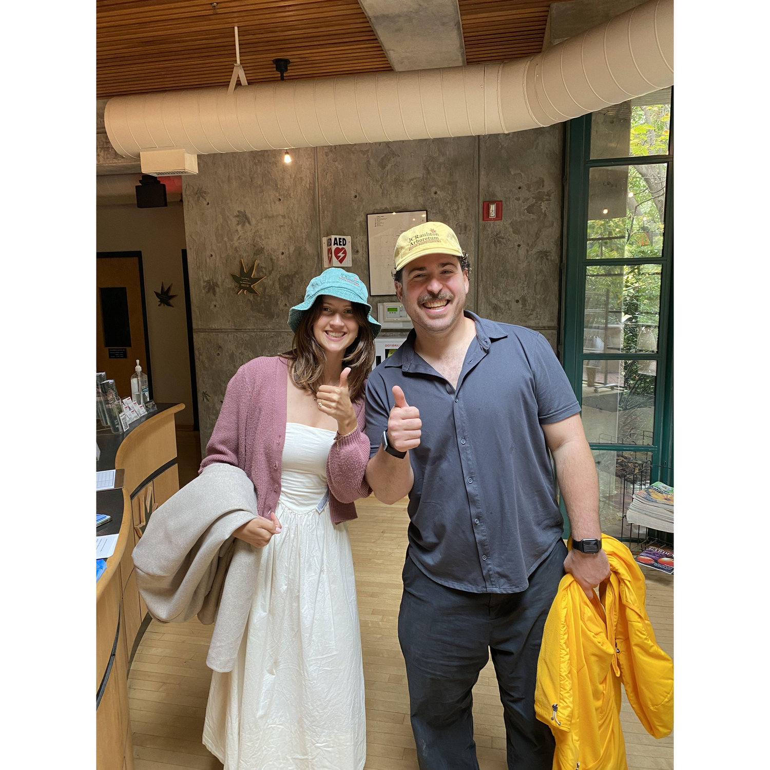We got matching hats at the place where we got engaged!