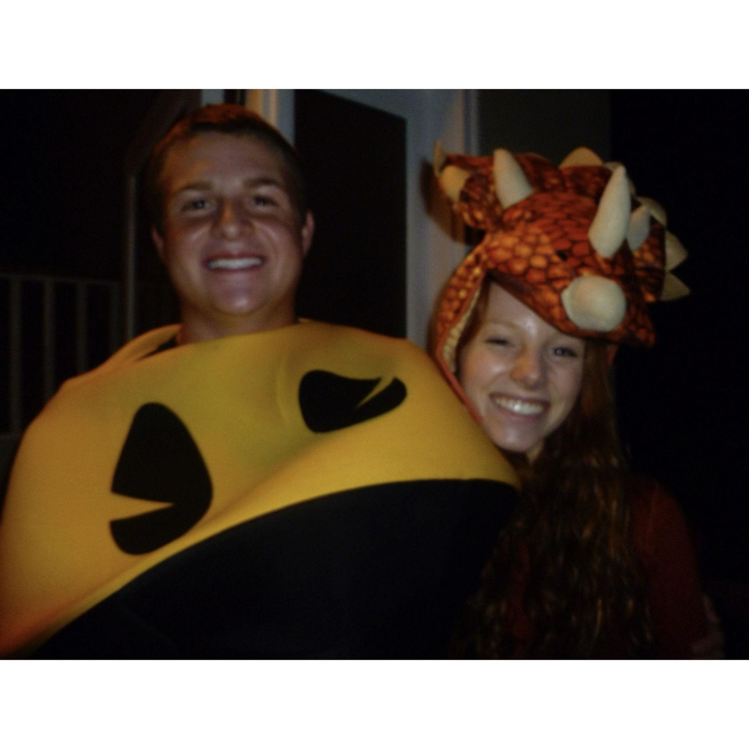 2010: A photo they took together at a friend's Halloween party; he was Pac-Man, she was a dinosaur