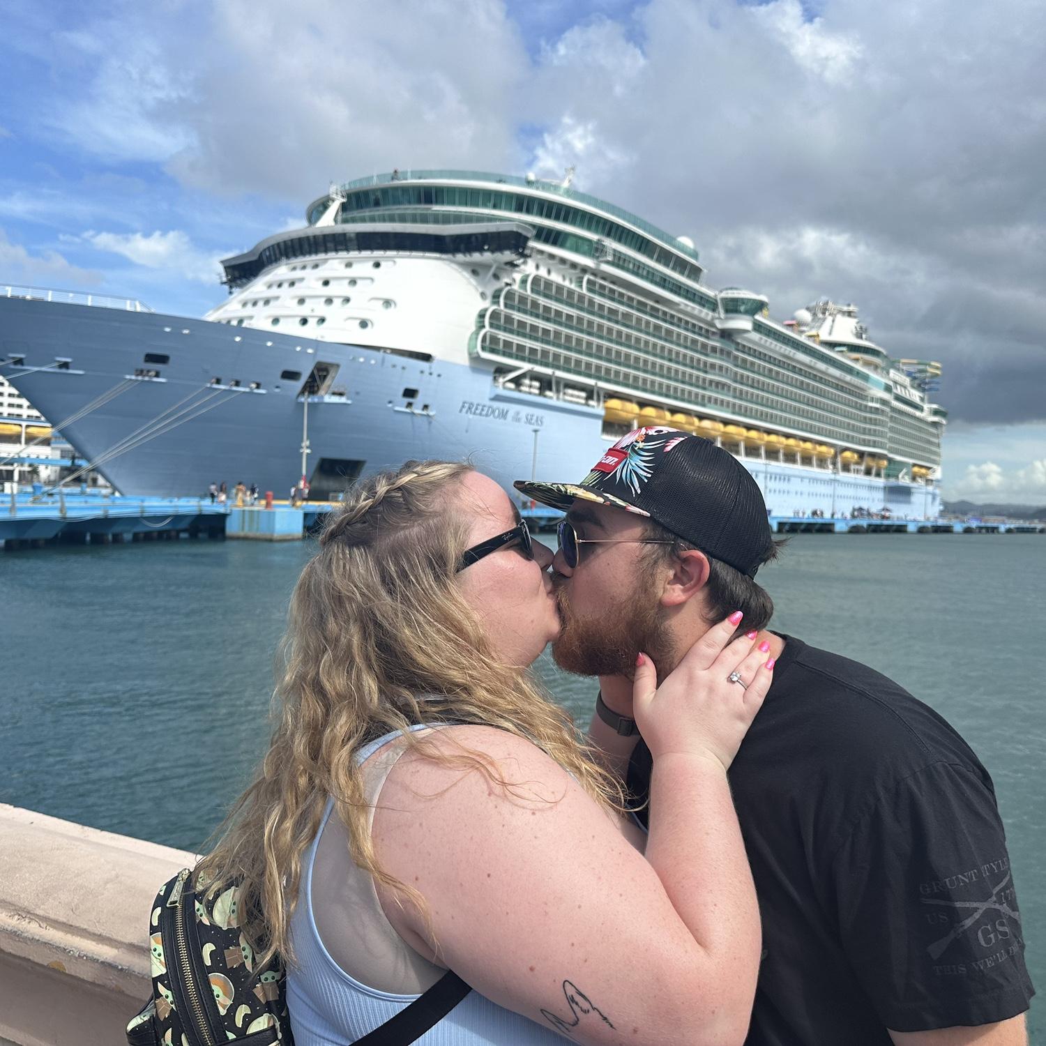In front of our cruise ship, Freedom of the Seas while in Puerto Rico.