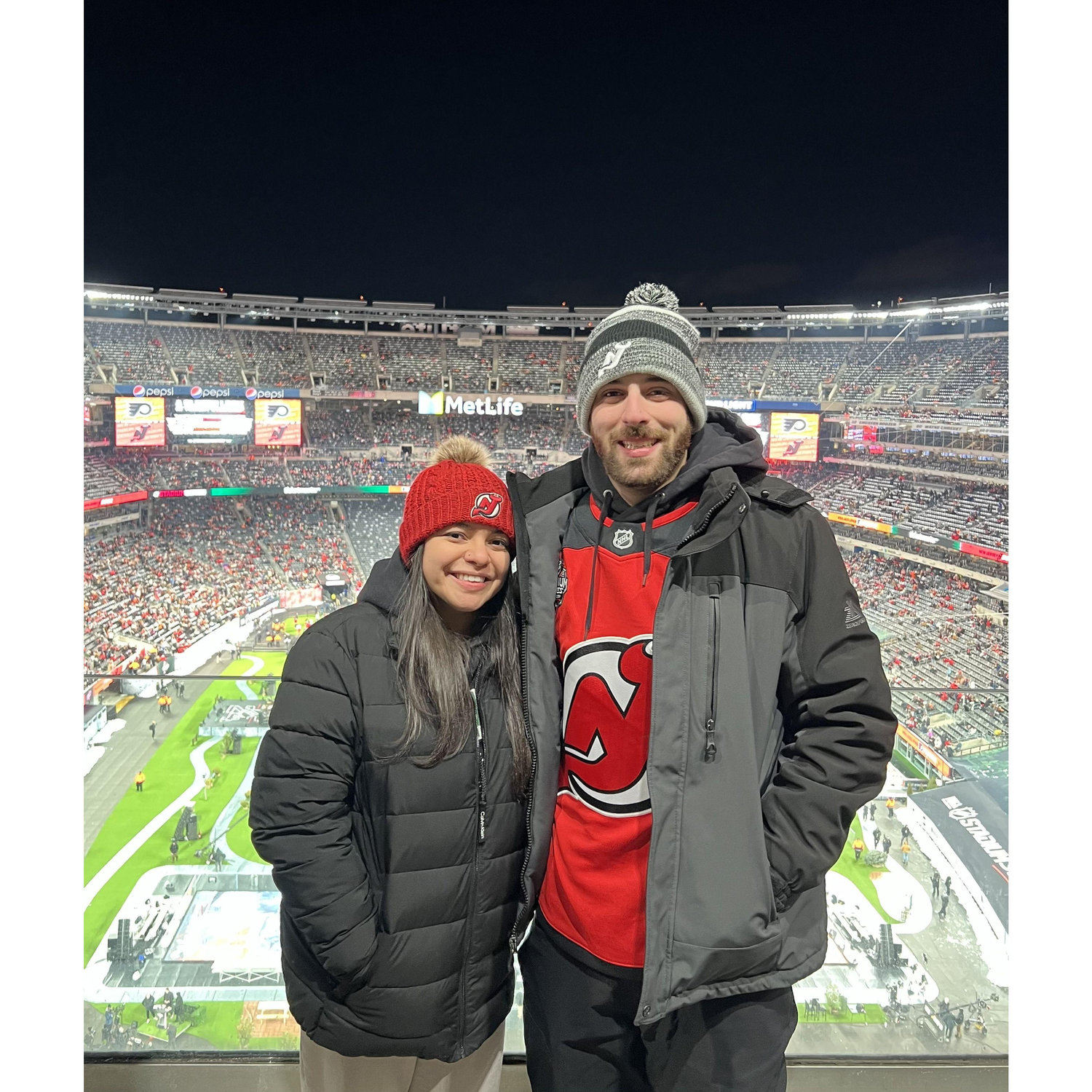 2/17/24 Thalia & Peter take on the Stadium Series. That win was worth freezing our toes off (5 degree windchill that night). GO DEVILS!