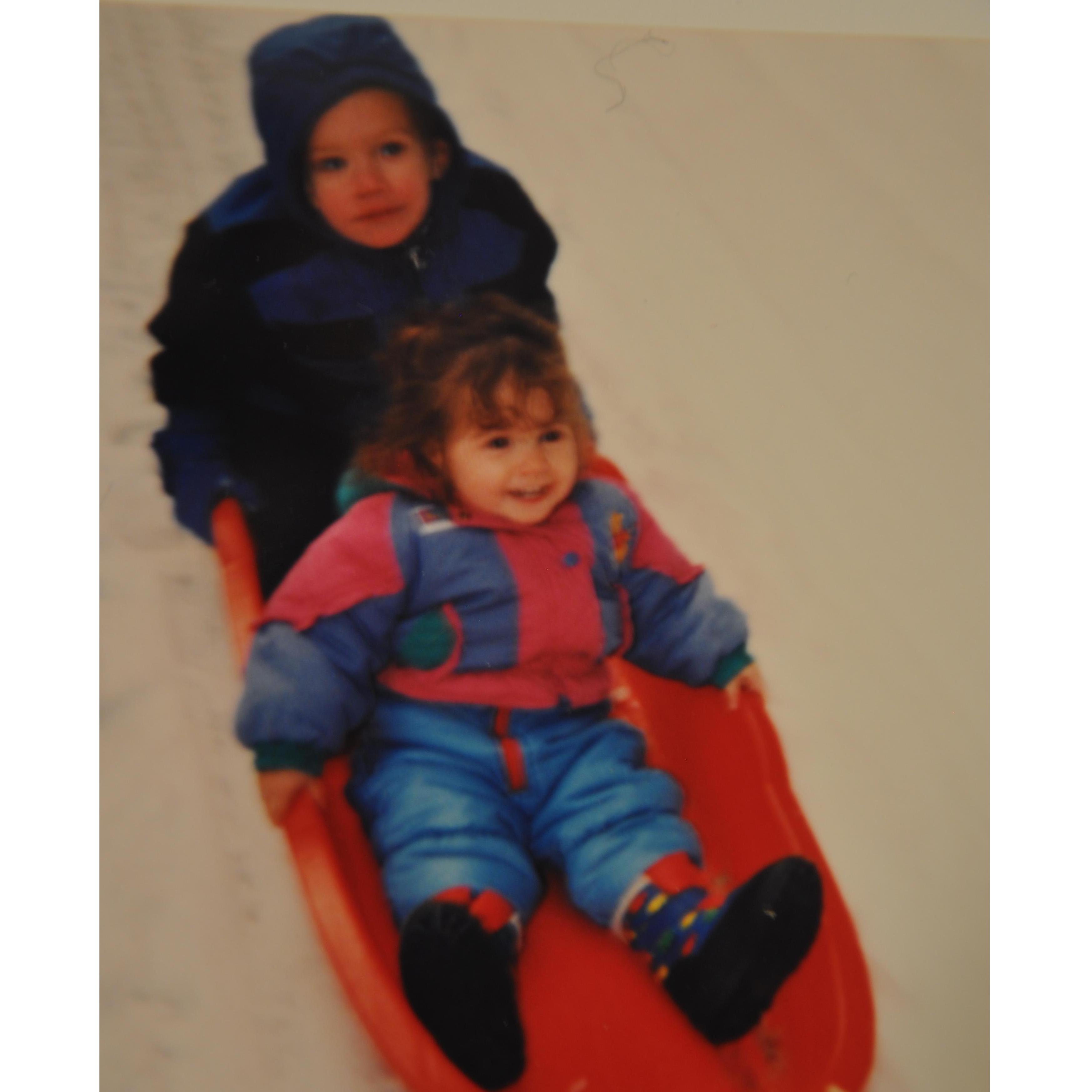 I love this picture of us. We had so much fun being tugged in that sled. I just wish it were less blurry. ;)