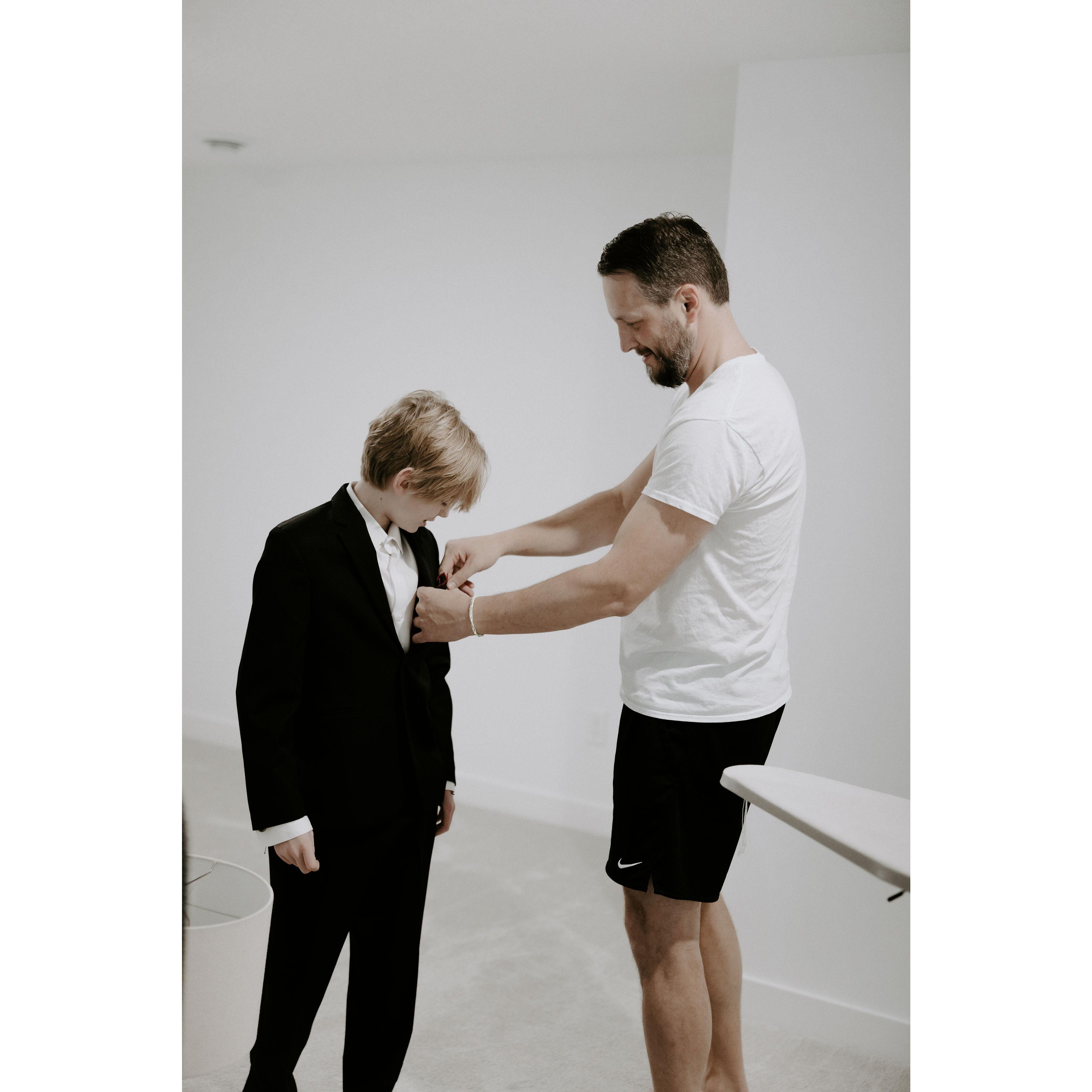 Aaron helping Reid get ready
