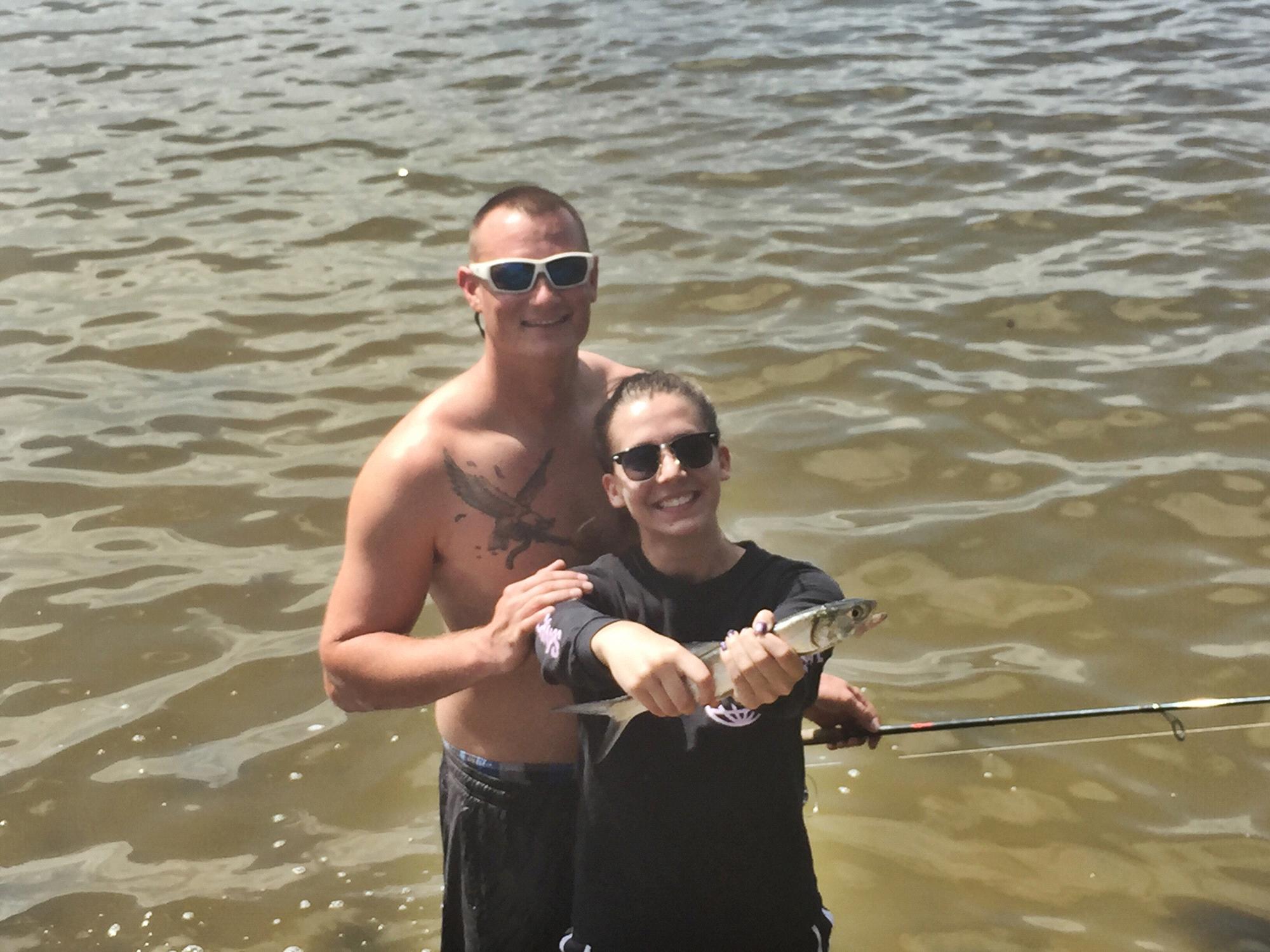 June 2017 - Becca drove to Cocoa Beach to spend time with Drew while he was working out of town. While they were together she out-fished him with a little Rattletrap lure!