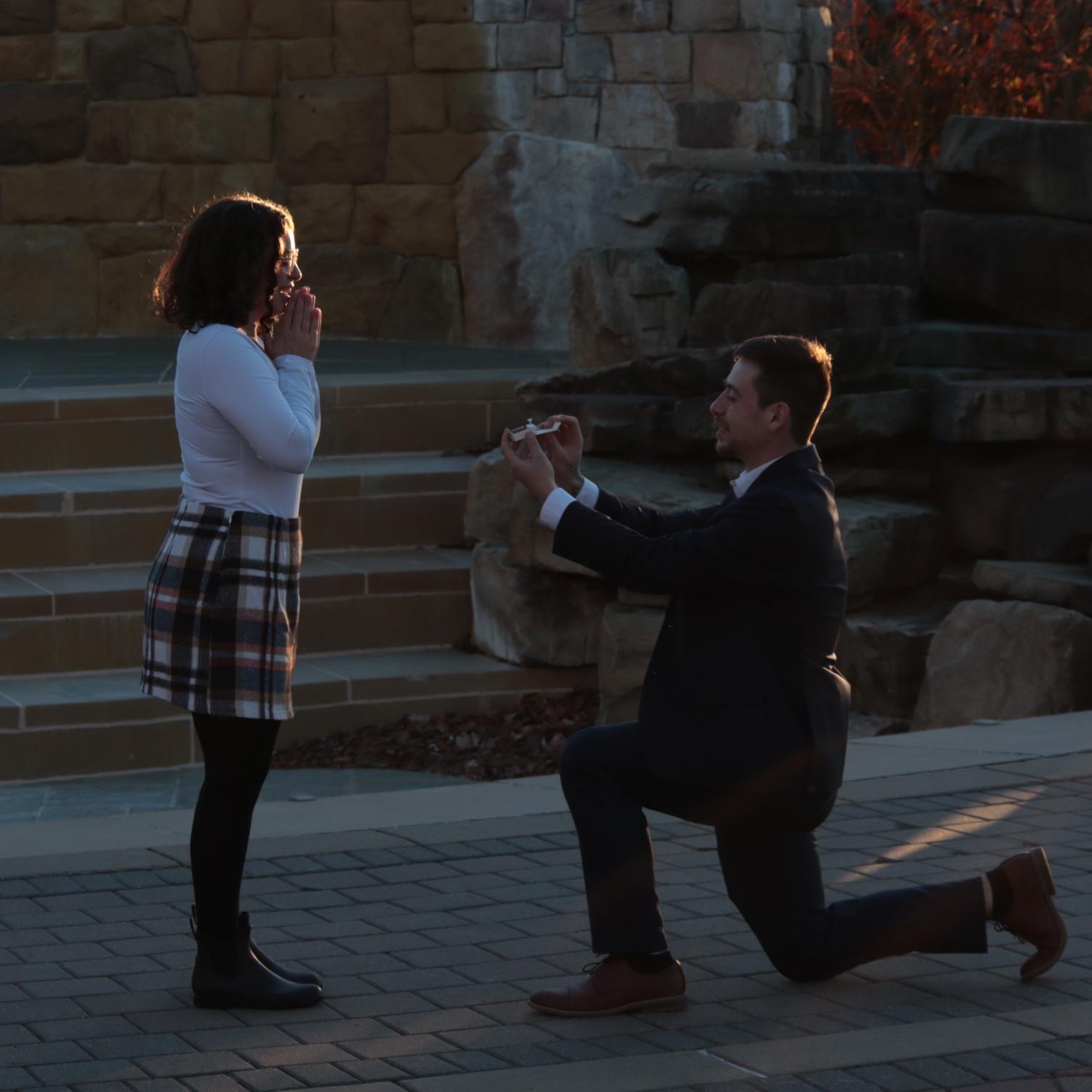 Mike proposed at Kutztown University (where we first met). Little did I know that he would drive around the town and talk about our memories together. We ended at the fountains where he proposed!
