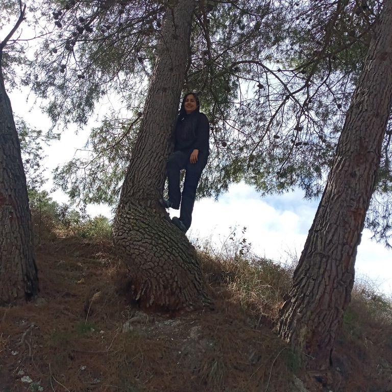 Ceci showing off how much she loves trees.