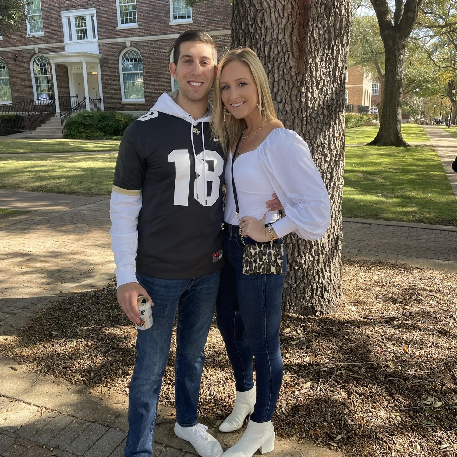 House divided as we cheered on UCF vs SMU in Dallas (Ponies for the win!)