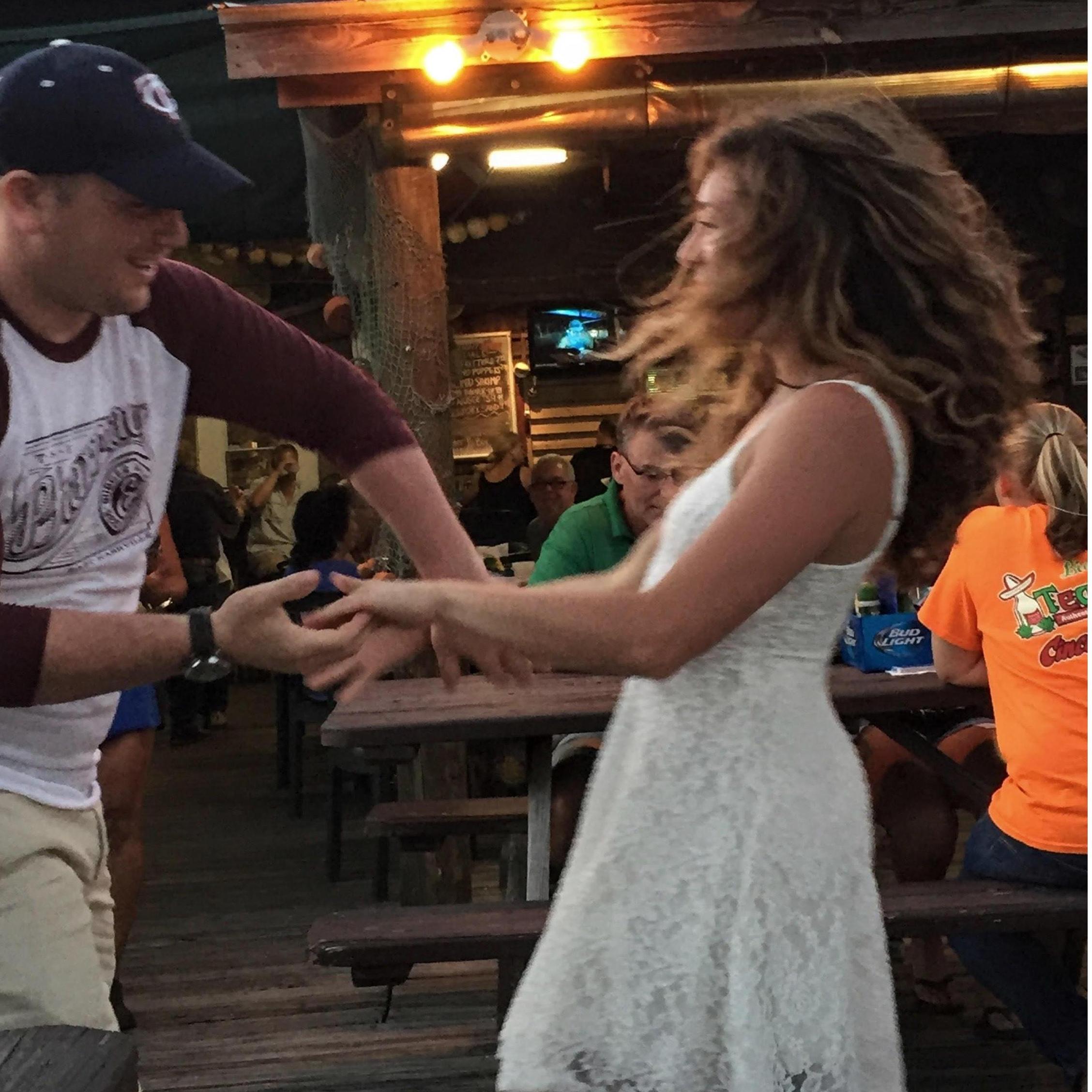We shared our first kiss as we danced for the first time, and we still love to show off our moves when we can!