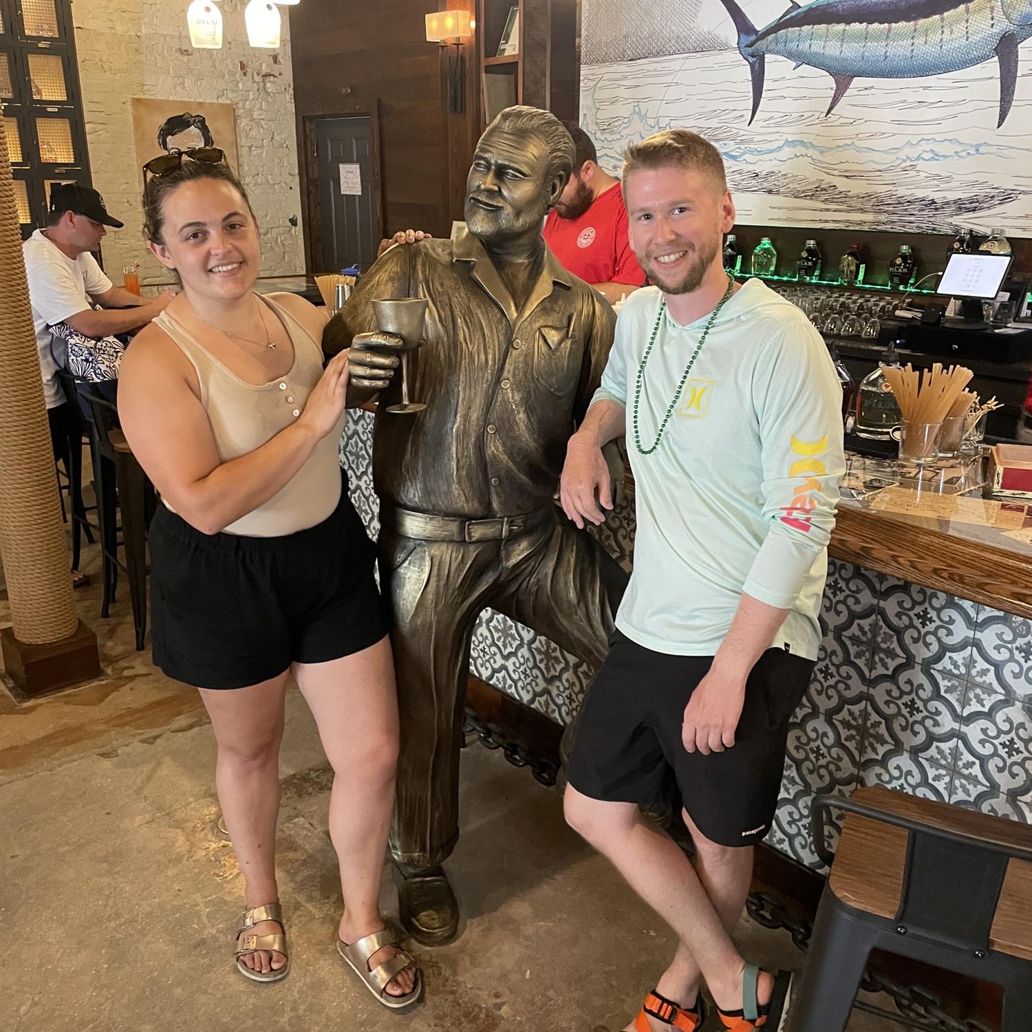 On a trip in Key West, they snapped a picture with Ernest Hemingway