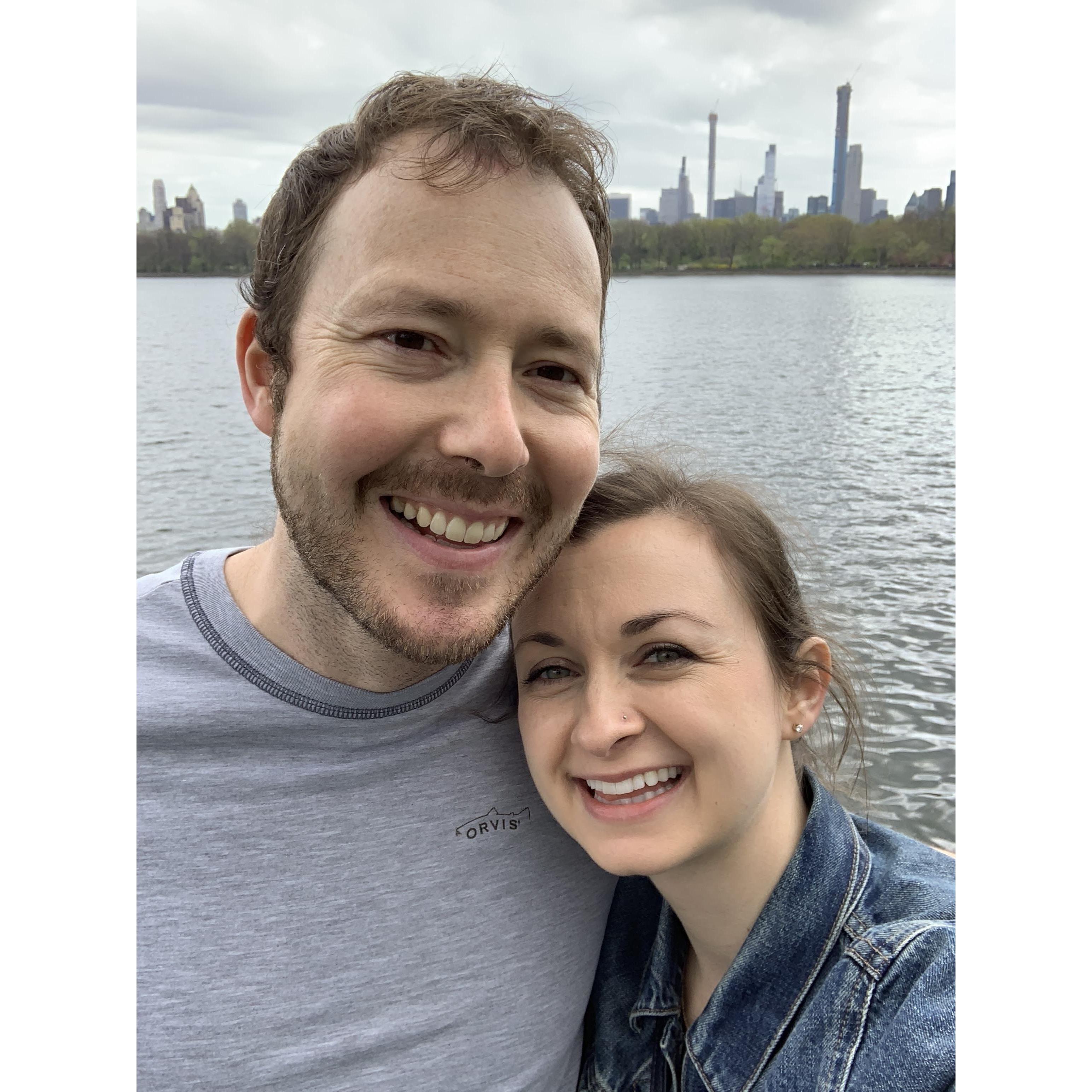 With the NYC skyline.