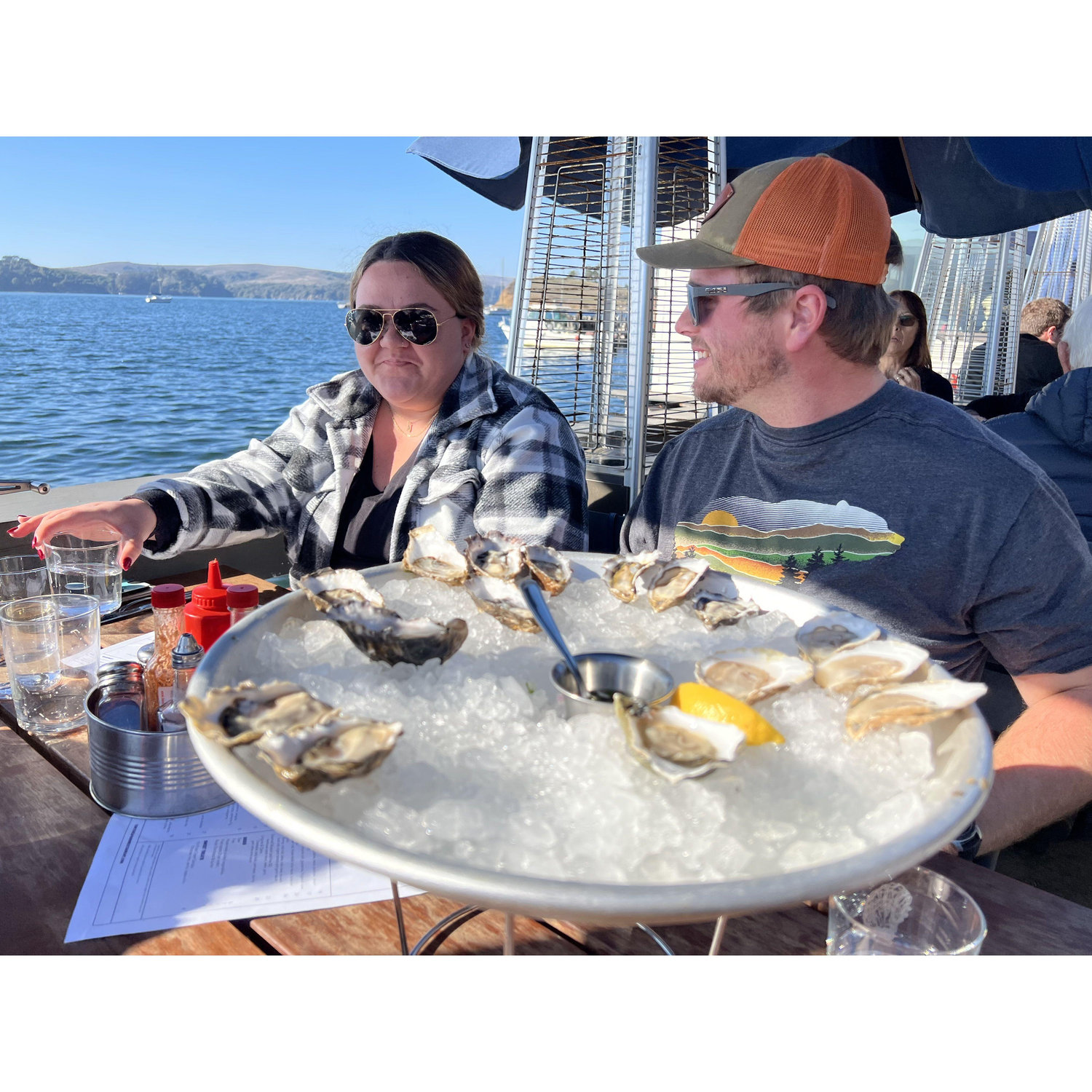 Allison and Jacob getting oysters at hog island. Allison was not a fan.