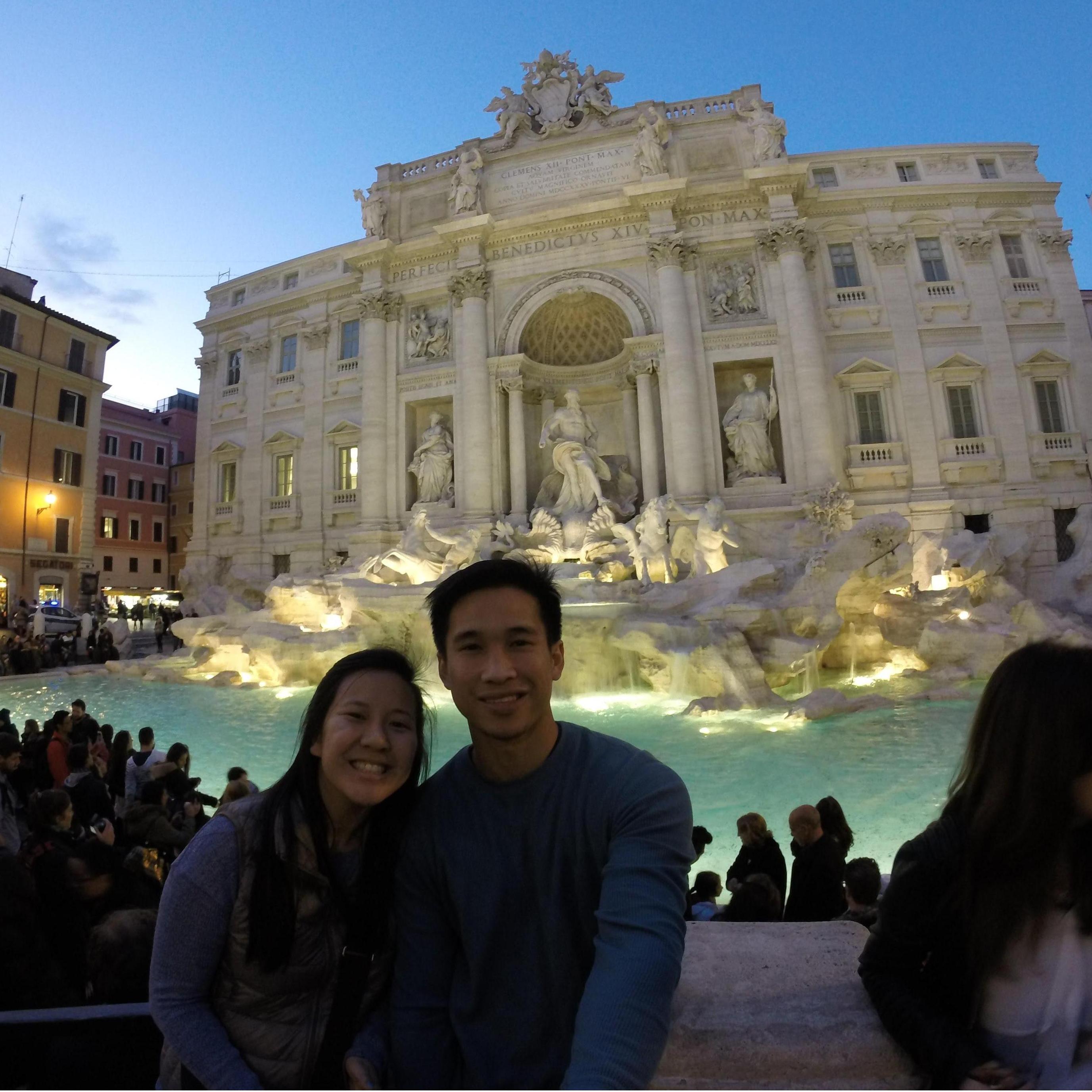 Learning how to use the selfie stick at Trevi Fountain