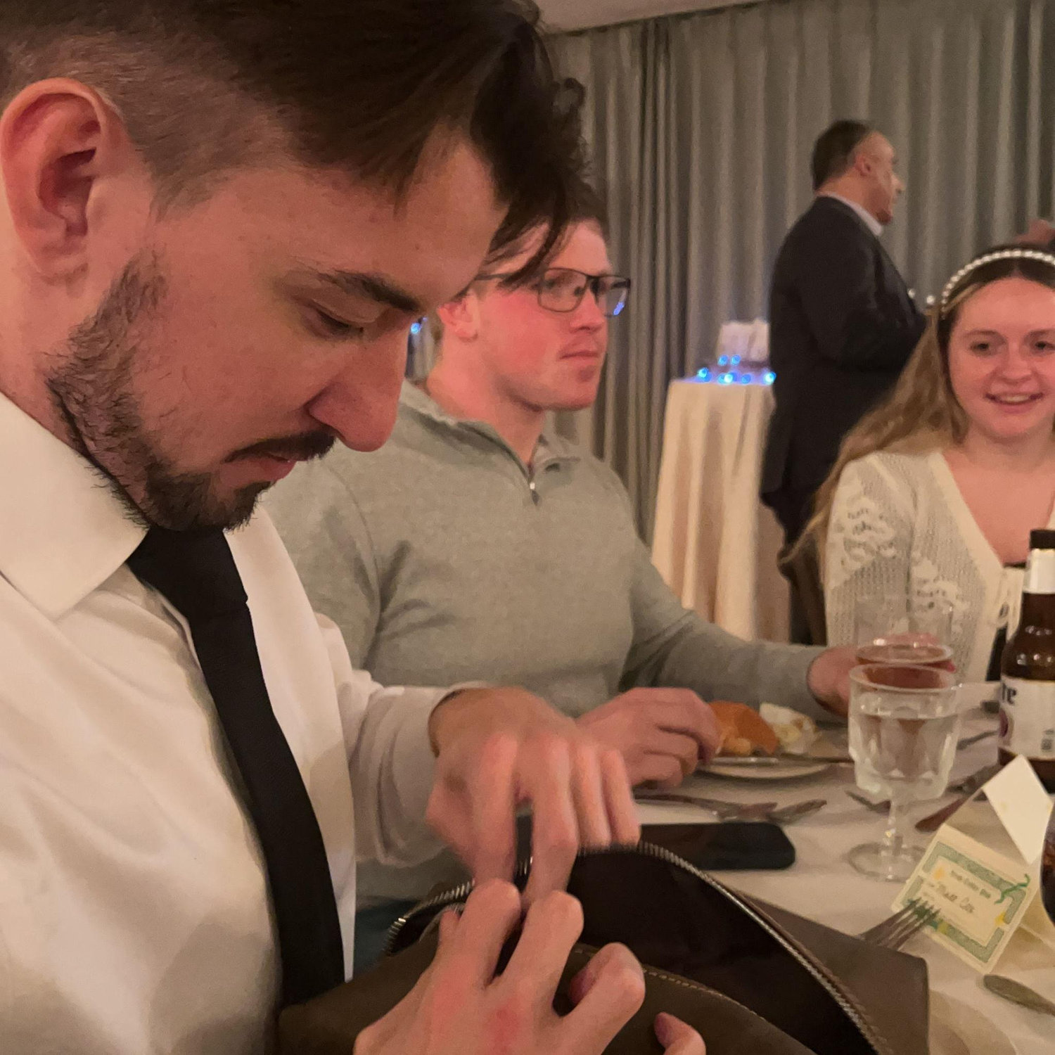 Matt opening his Groomsman gift