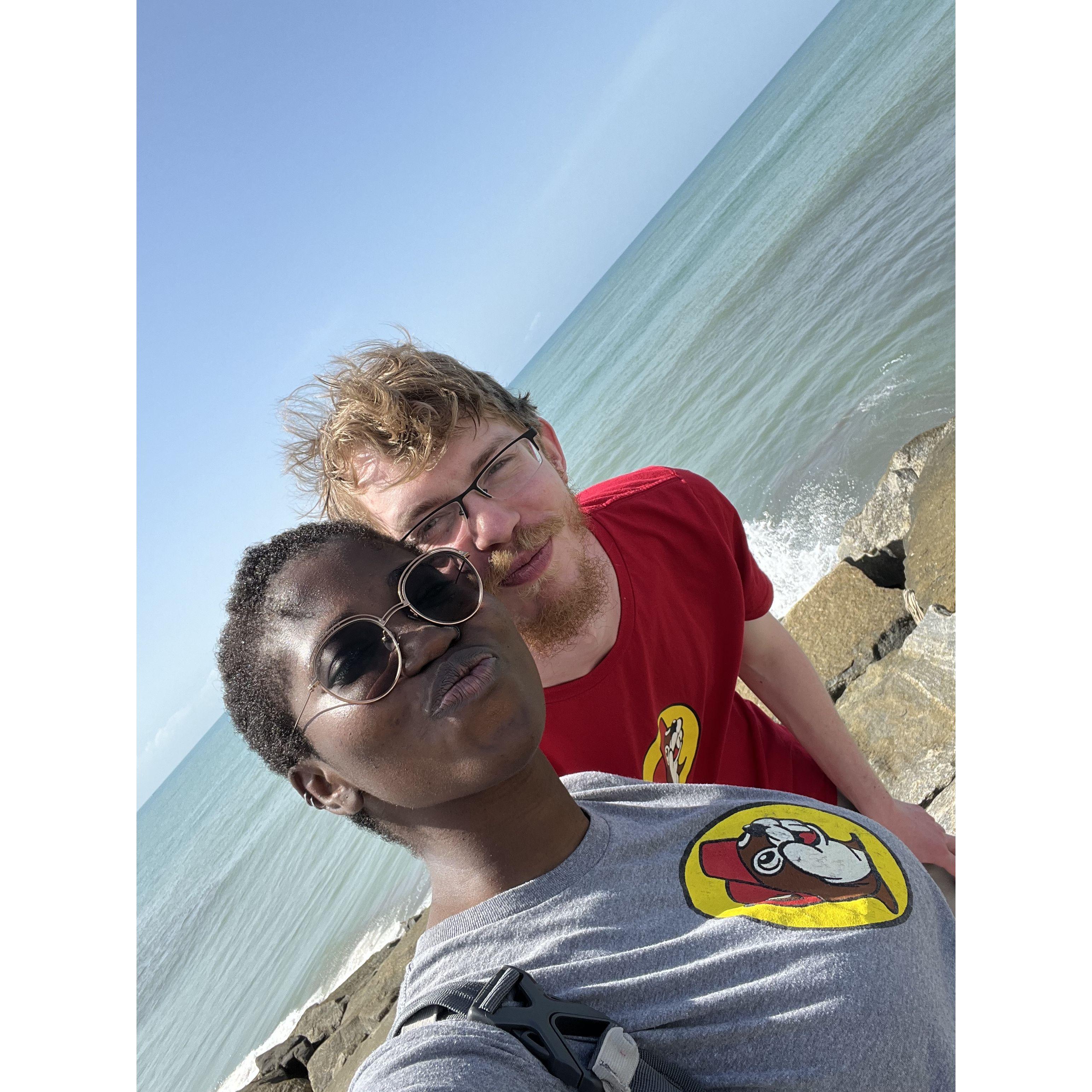 Rocking our Buc-ees t-shirts on a beach in Cape Coast