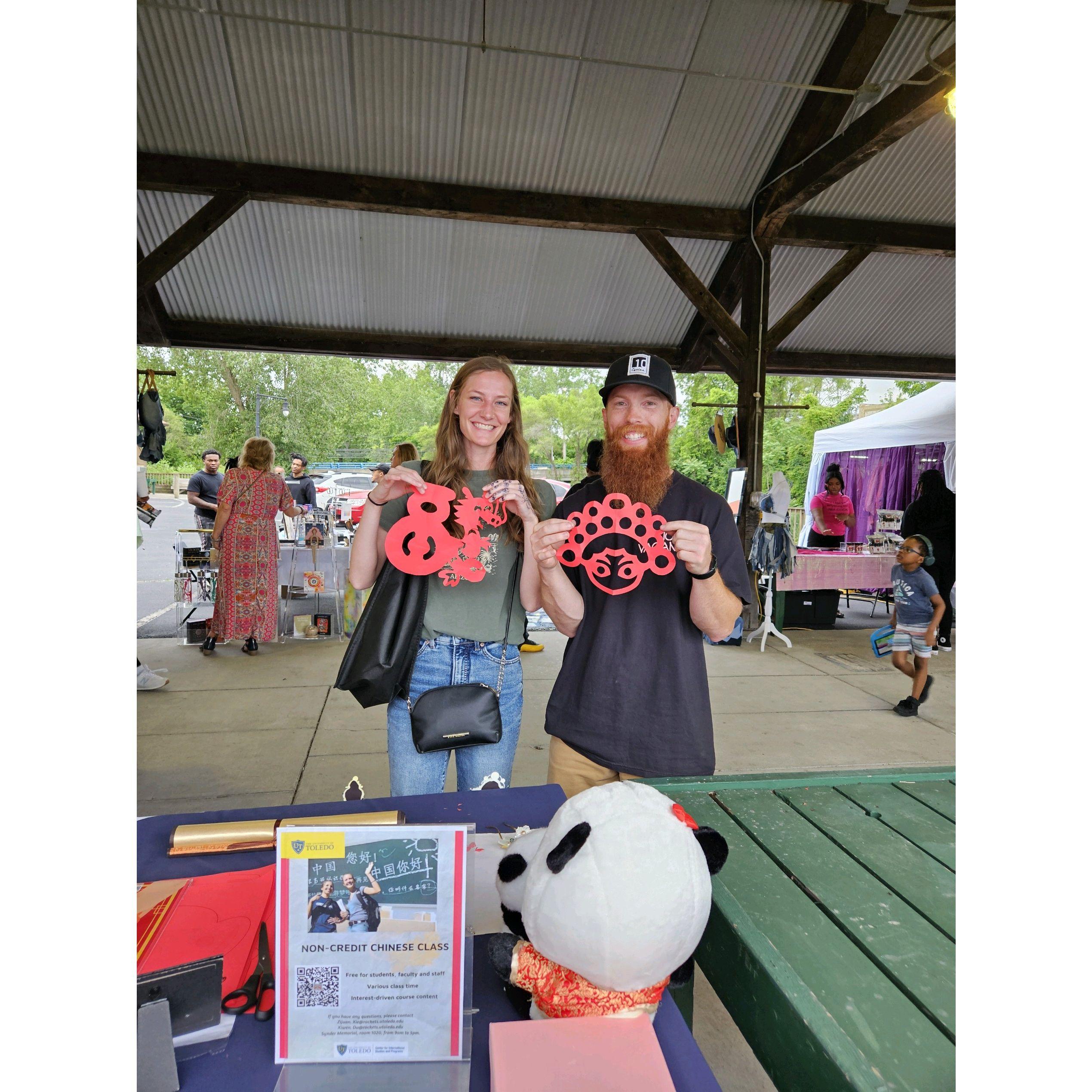 Our first picture together! We were at a cultural farmer's market.