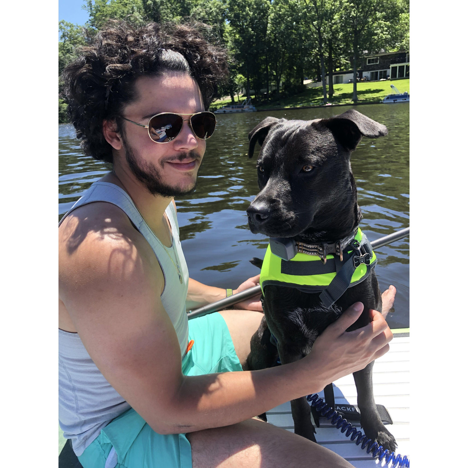 Blue joining us for paddle boarding on the lake.