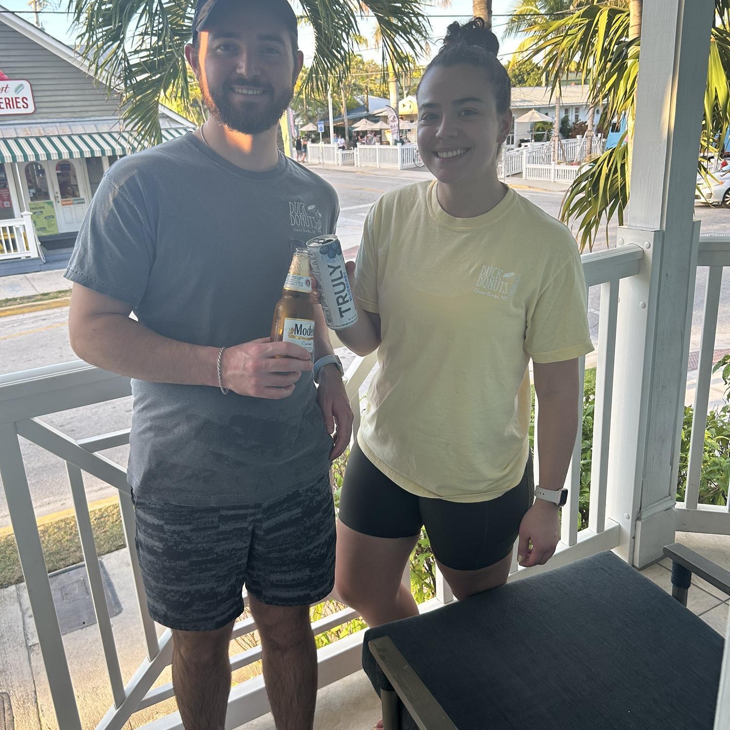 Olivia & John enjoying drinks in Key West. One of their favorite places to vacation.