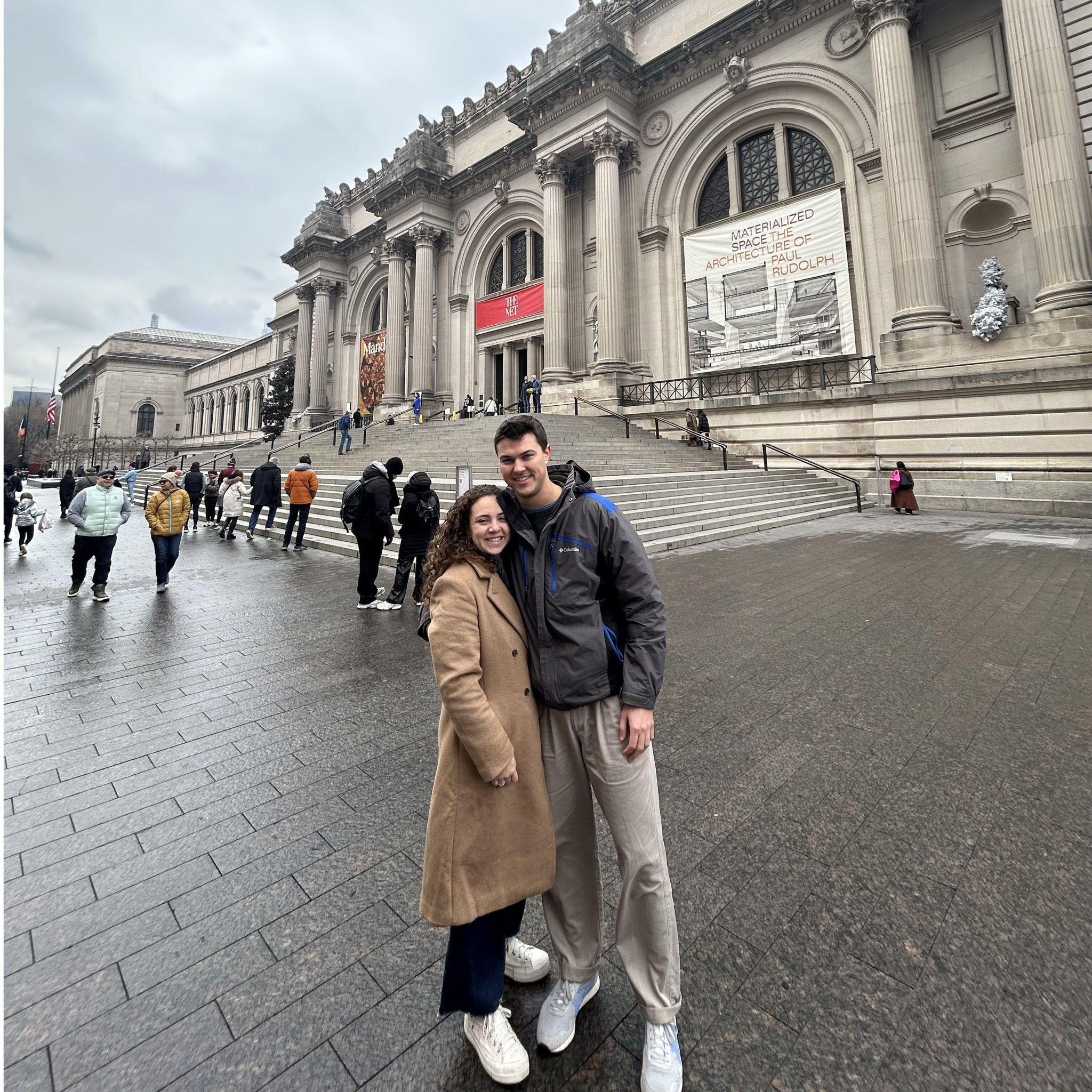 This photo is distorted. Neither one of us is that tall. Nor do either of us have feet that big.