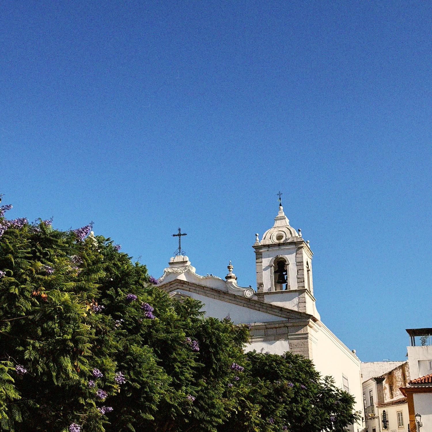 Praça Infante D. Henrique – located in the heart of Lagos, a lively square surrounded by historic architecture, cafés, and local culture.