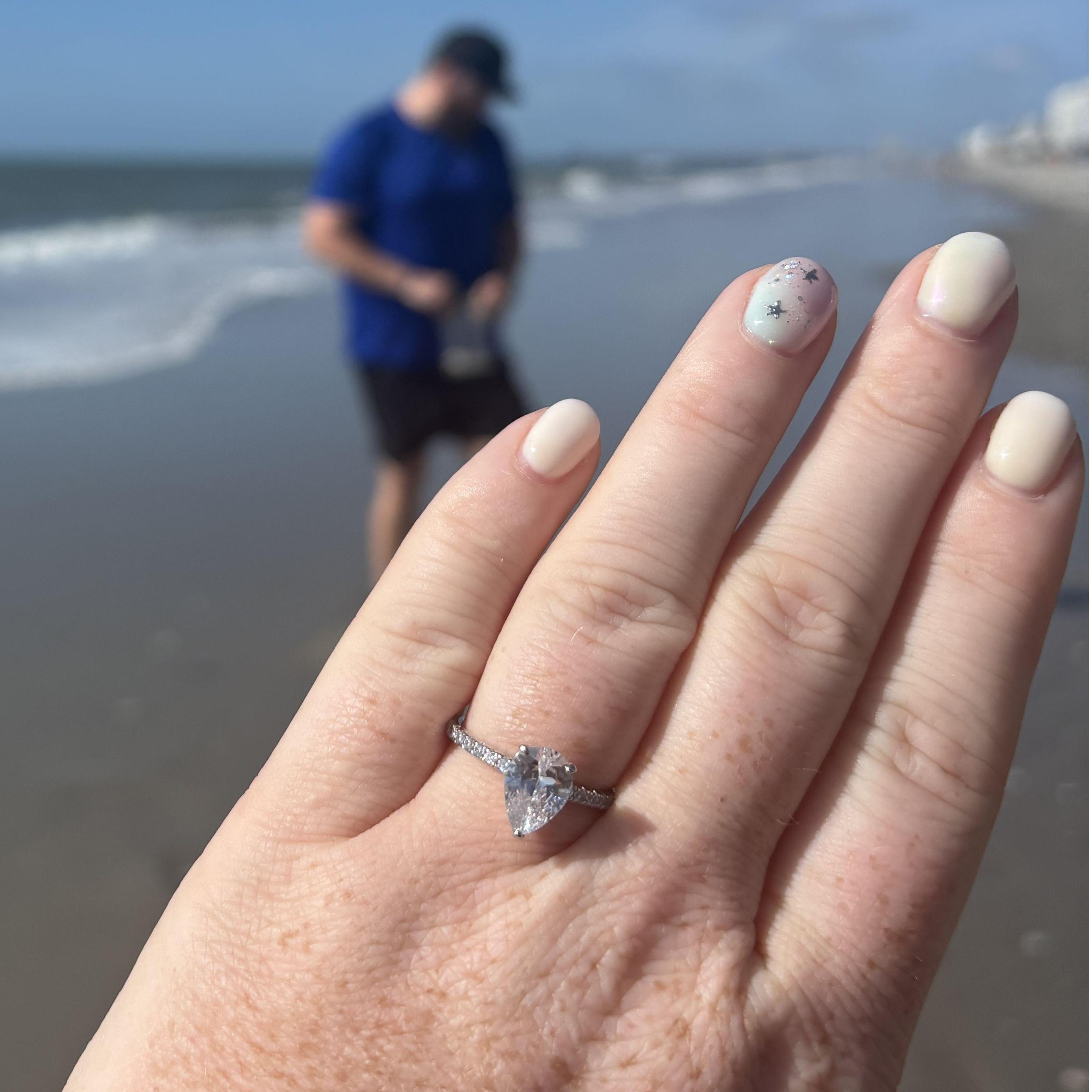 Zach managed to plan a surprise trip to the beach to pop the question.