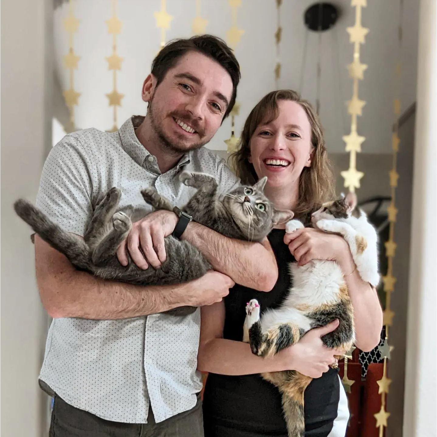 A perfect depiction of what it's like to be the parents to two cats. ;)