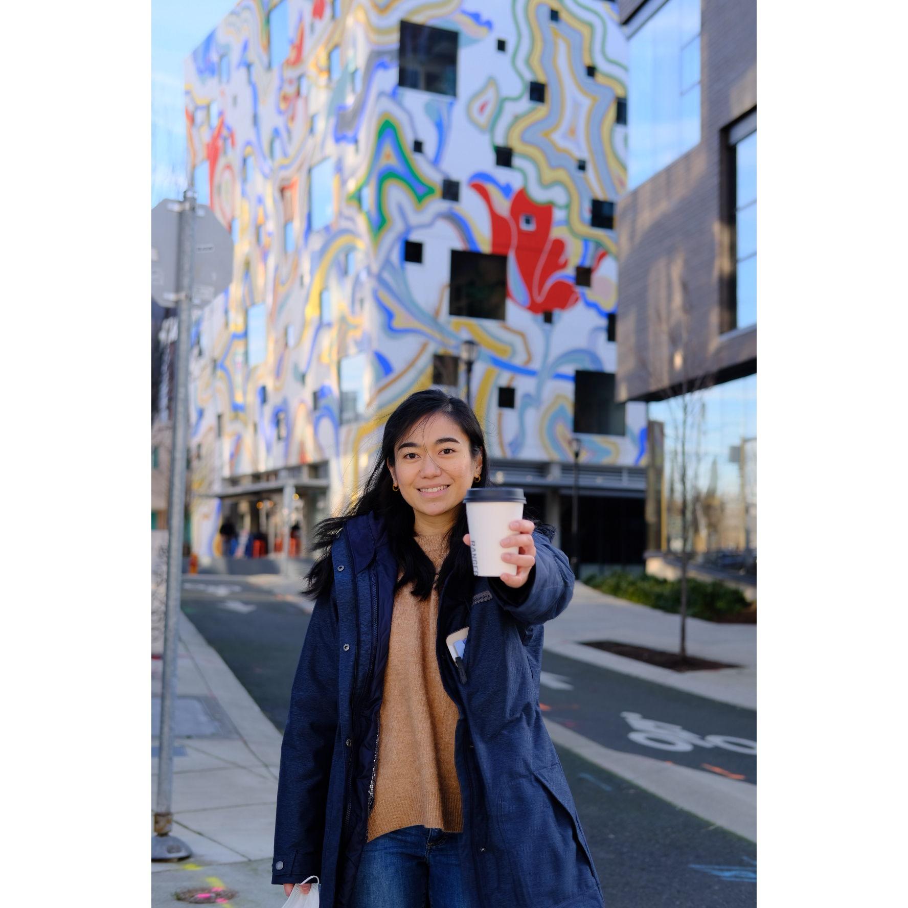 Wanted to show off this artsy building and somehow showcase that she loves coffee too!