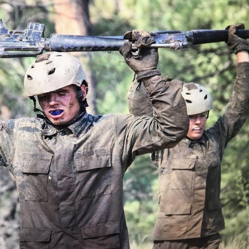 This photo was taken during the assault course during basic cade training at the air force academy. It is one of the most physical challenges that basic cadets go through during basic training.