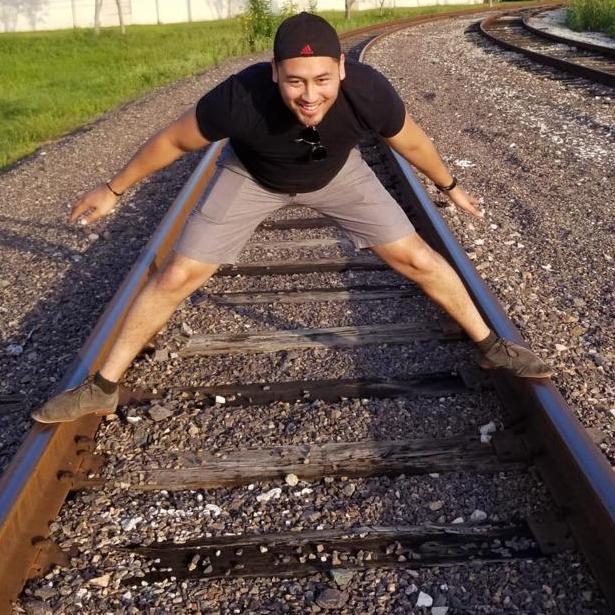 He is not flexible and was so proud to get each foot on the tracks...haha