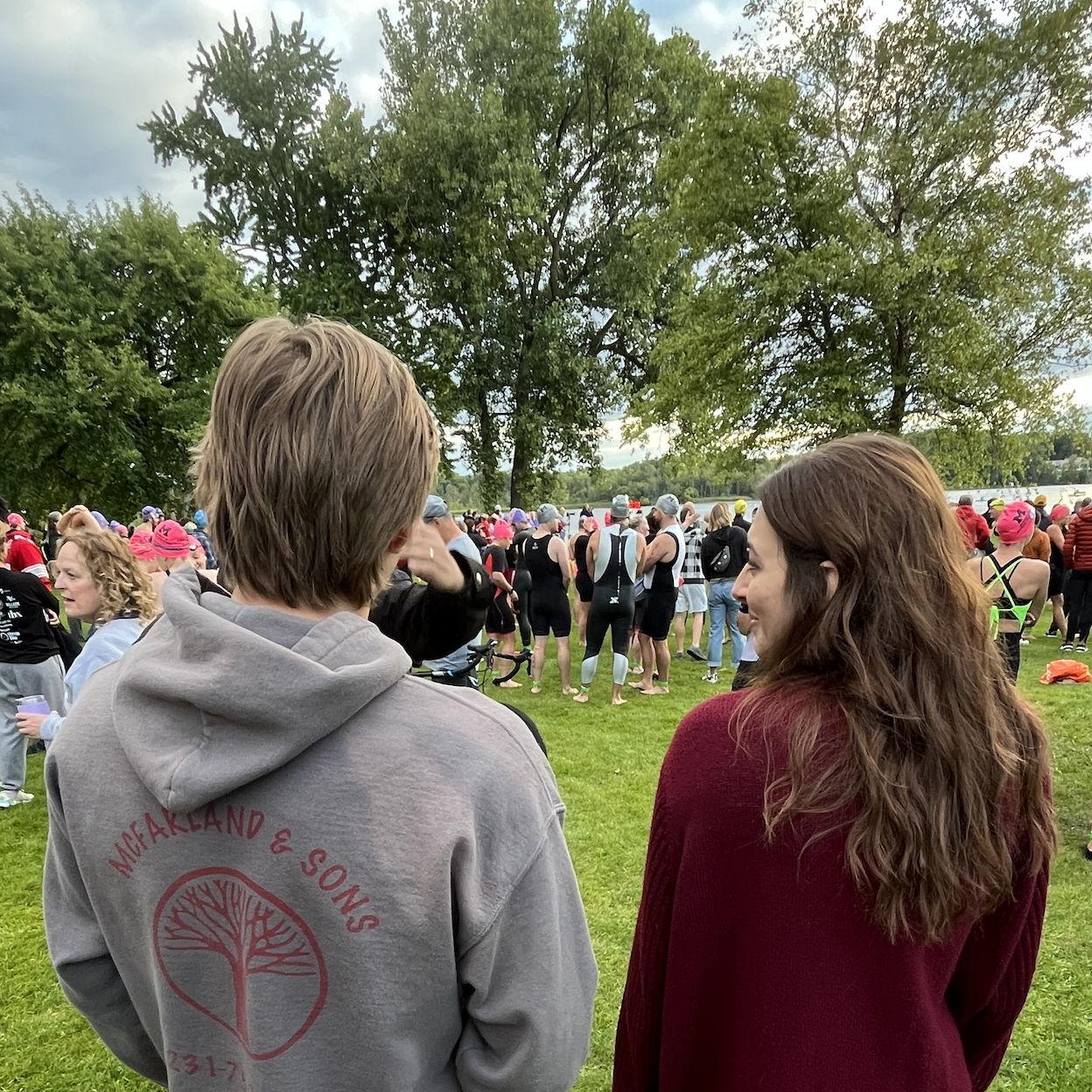 Riley cheering Cole on at his triathalon!
