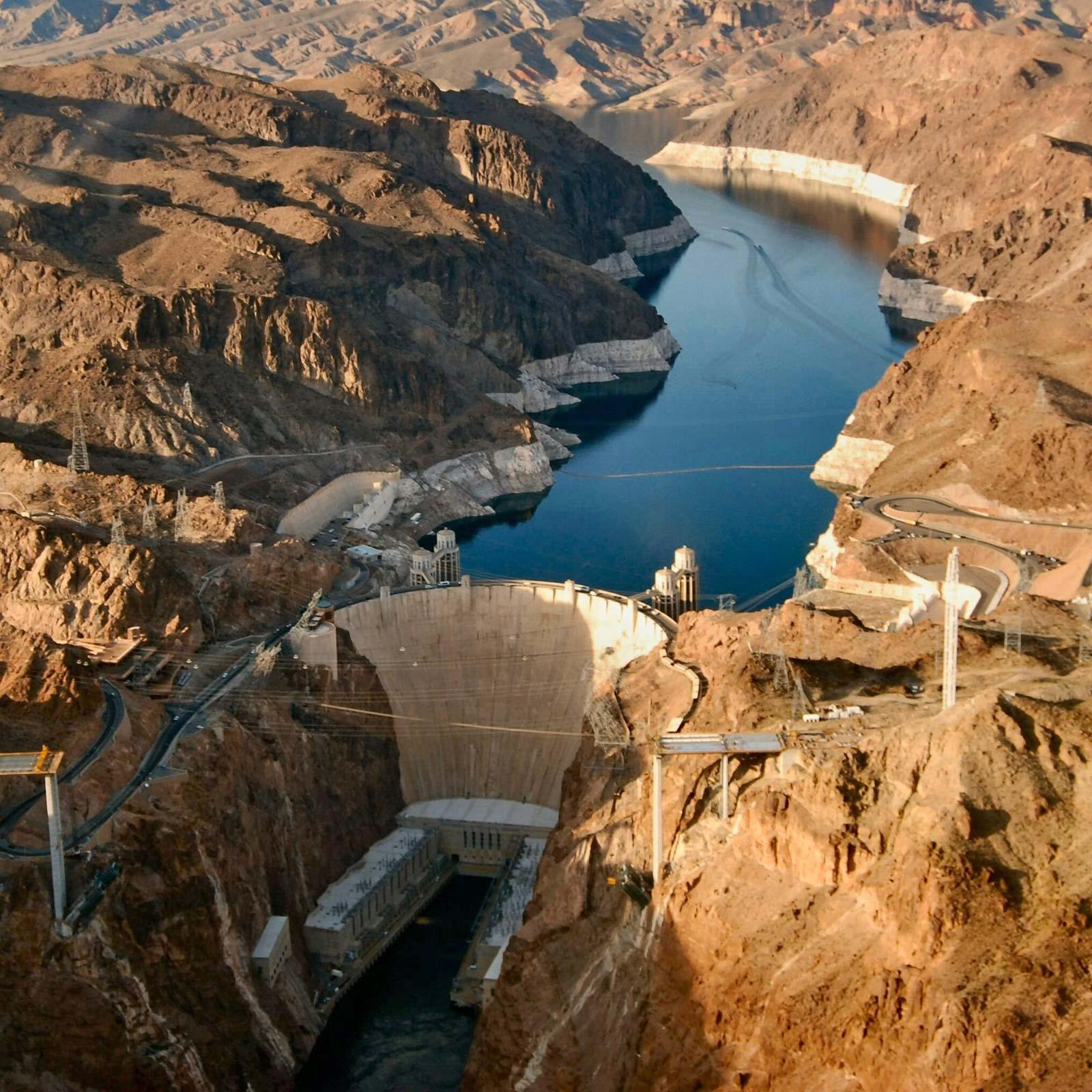 Hoover Dam: Hoover Dam is as tall as a 60-story building. It was the highest dam in the world when it was completed in 1935. Its base is as thick as two football fields are long.