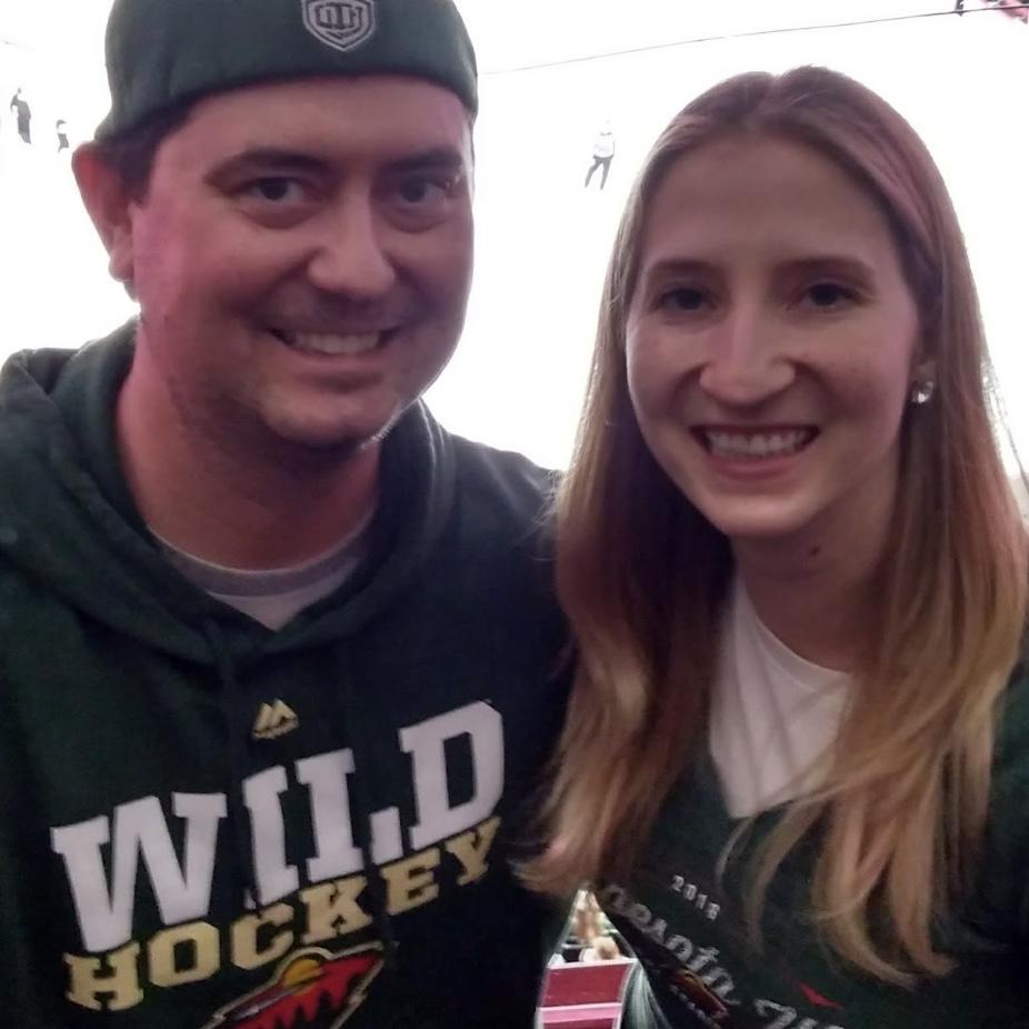 Ashley and her brother Matthew at a Wild hockey game.