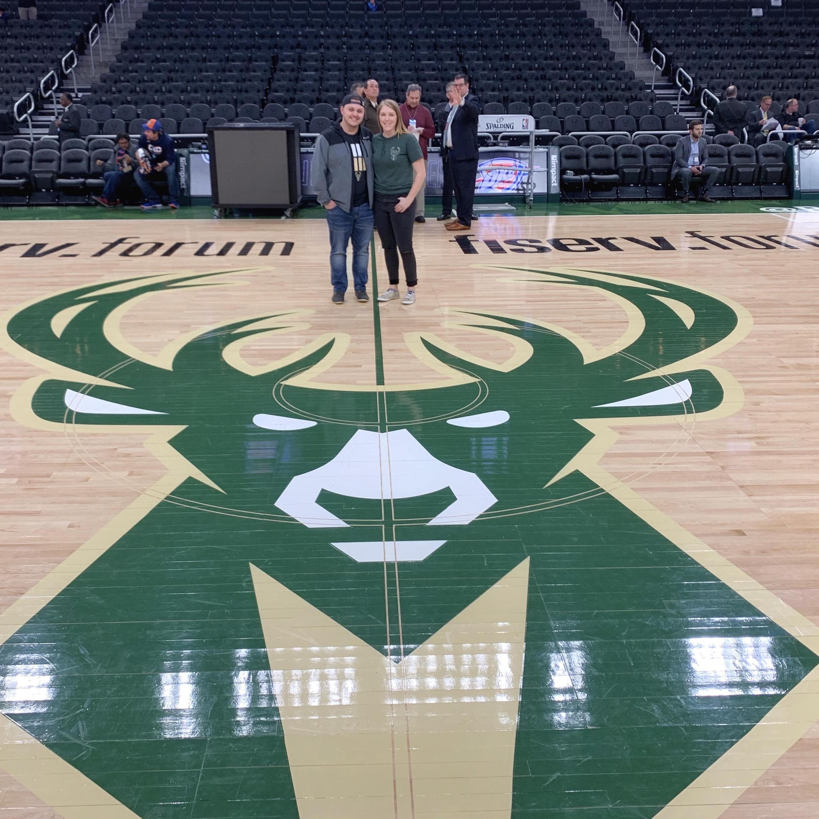 Shan got to take Adam to his first NBA game and they even got down on the court, thanks to an FM106.1 listener!