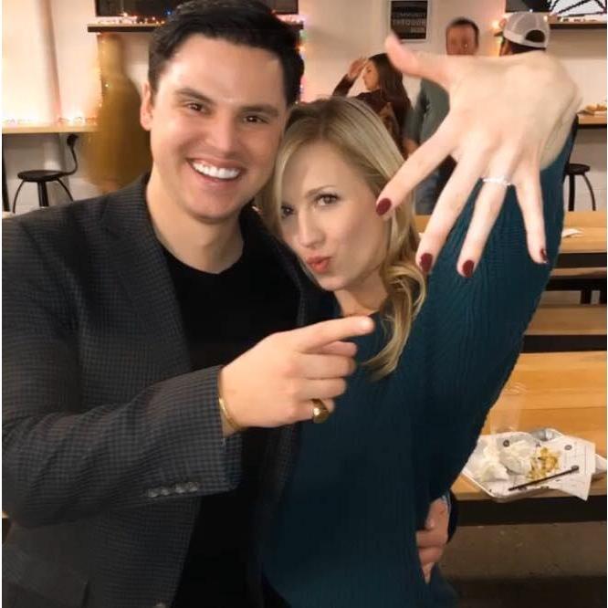 Becca casually showing off her ring at the surprise engagement party Grant planned.