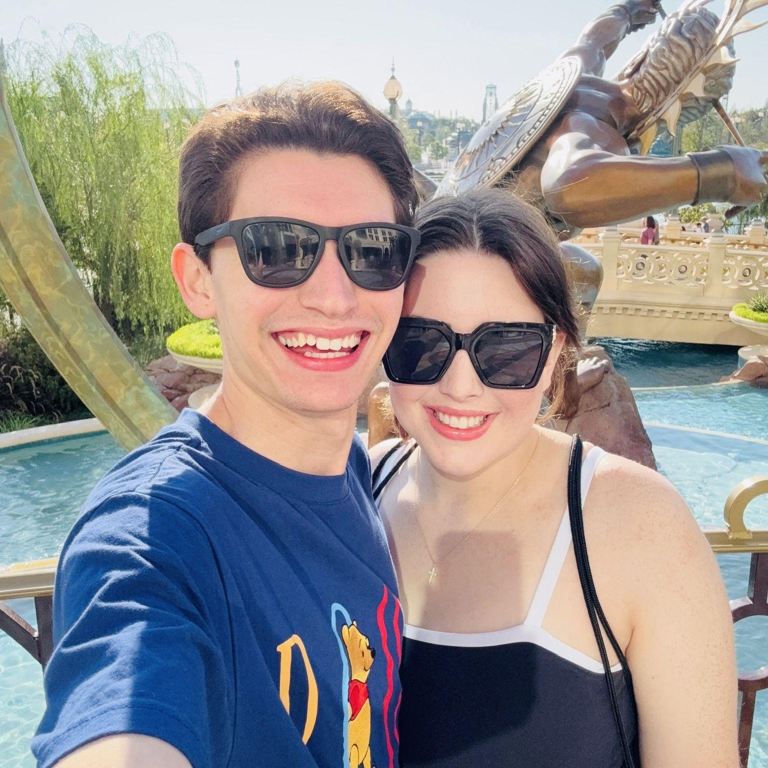 Margo and William outside of the Grand Helios